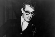 In this undated file photo, American rock and roll singer Buddy Holly performs in the 1950s.