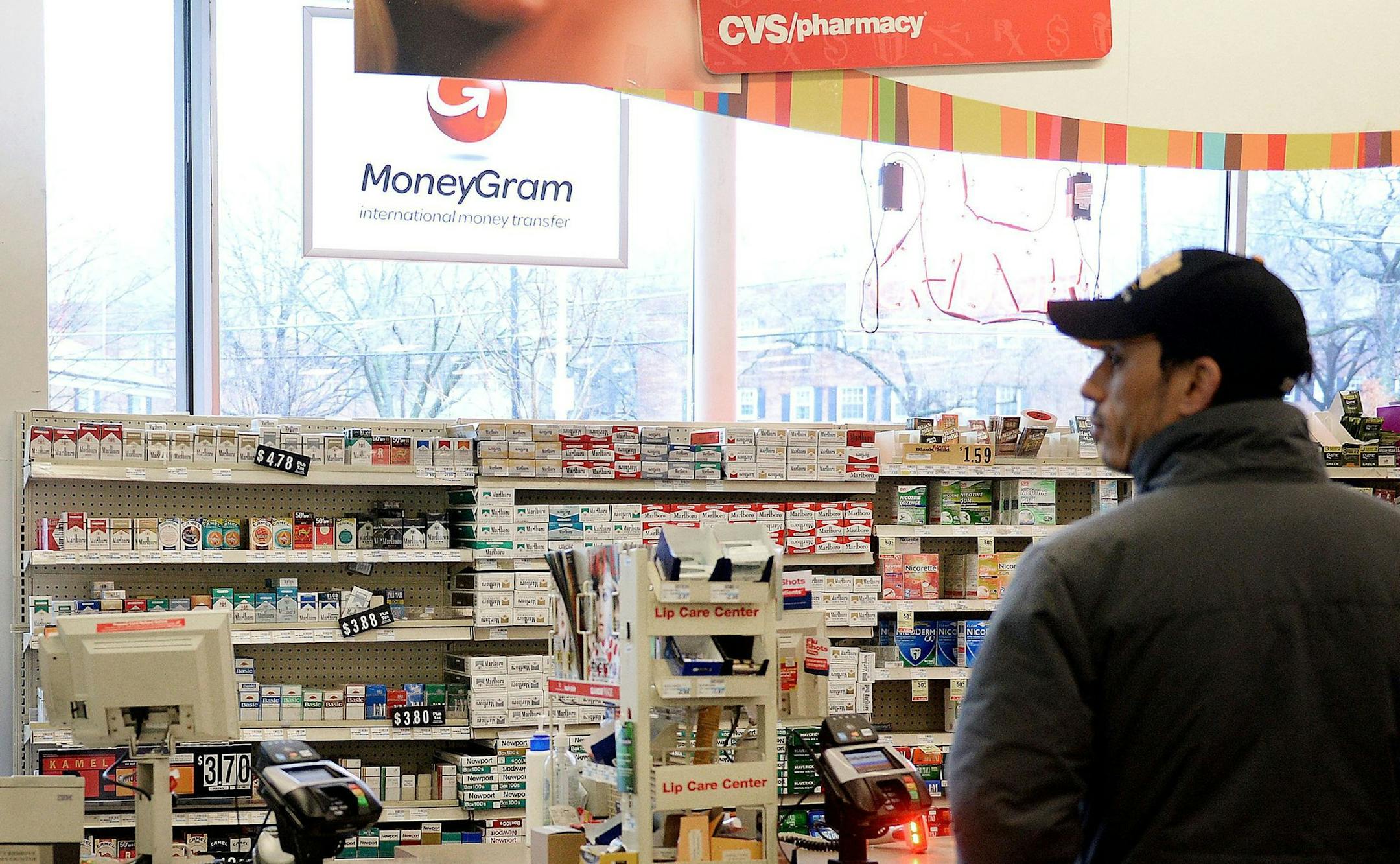 One of the nation's biggest pharmacy chains, CVS Caremark, announced today, Feb. 5, 2014, that it will clear its shelves of cigars, cigarettes, and other tobacco products this year, giving up almost $2 billion in sales in order to brand itself as a health care company rather than a convenience store. (Olivier Douliery/Abaca Press/MCT) ORG XMIT: 1148717