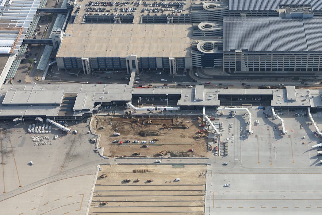 An aerial view of Concourse G taken in August 2023 shows the connected jetbridges of gates G10 and G11 just above the part of the apron that was being resurfaced.