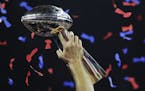 New England Patriots' Tom Brady holds up the Vince Lombardi Trophy after winning the NFL Super Bowl 51 football game against the Atlanta Falcons, Sund