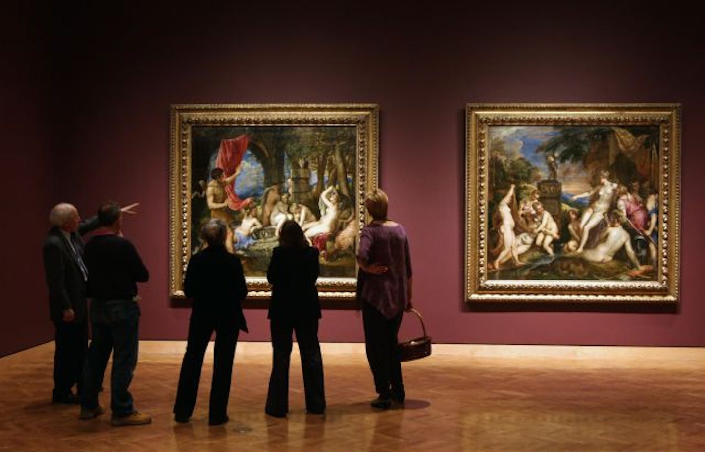 From left, Minneapolis Institute of Arts curator Patrick Noon, National Galleries of Scotland's Alastair Patten and others checked the installation of Titian's "Diana and Actaeon" and "Diana and Callisto" at MIA. A show of Renaissance paintings opens at the museum Sunday.