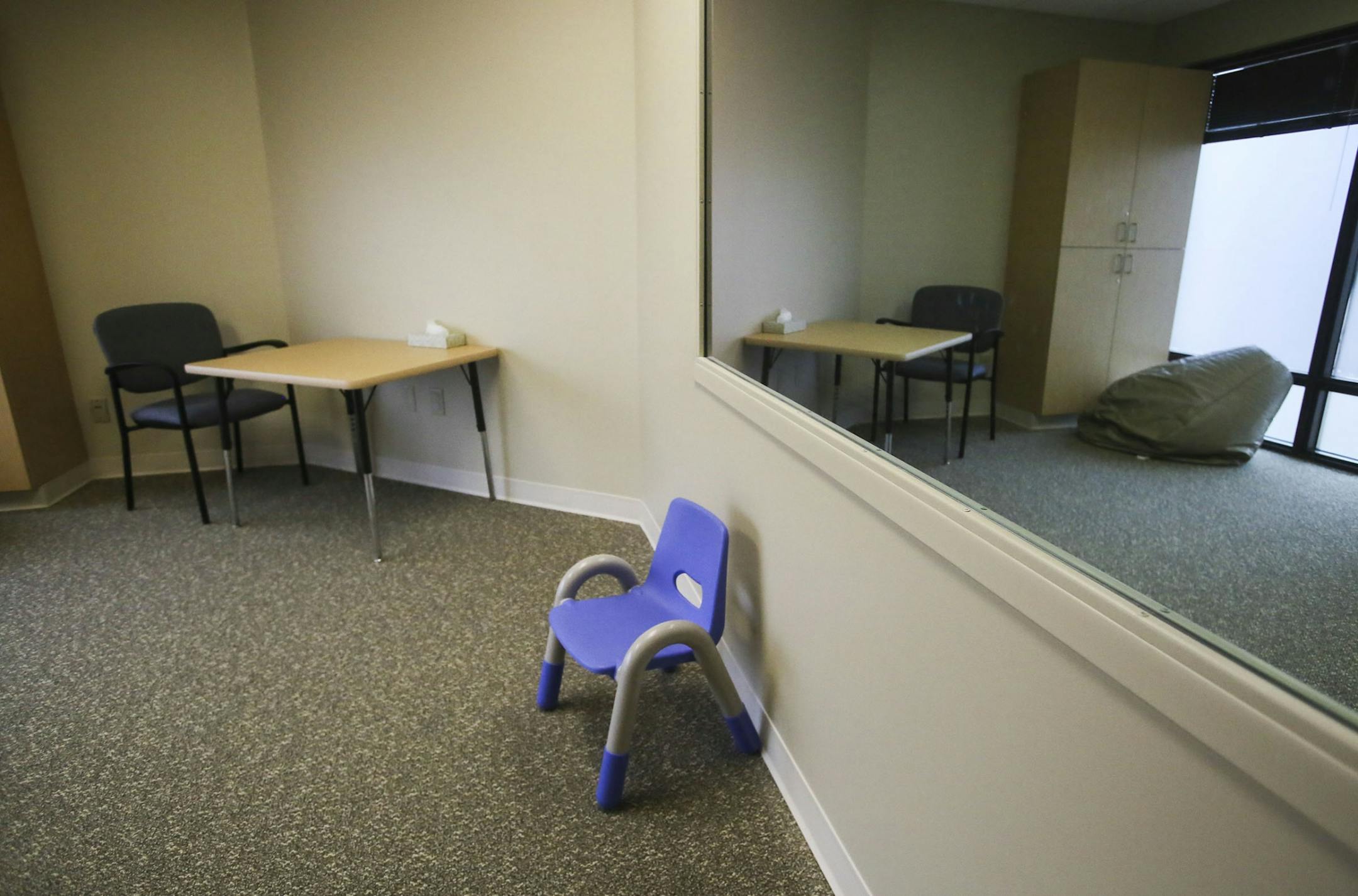 Local designer A.J. Paron-Wildes, whose son is autistic, had helped to design the space at Fraser Eden Prairie and seen Wednesday, Oct. 23, 2014, in Eden Prairie, MN.Here, an evaluation room offers muted wall and floor tones, a frosted window to the outside and a one-way mirror window for observation.