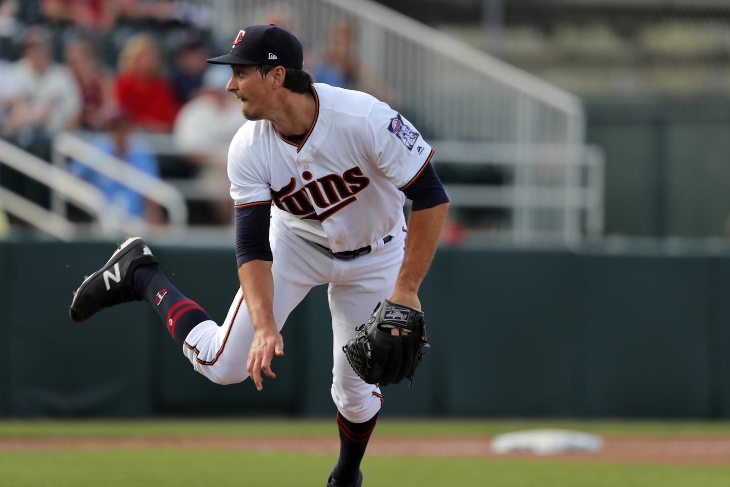 Minnesota Twins Ryne Harper pitches in the ninth inning of their spring training baseball game against the Boston Red Sox in Fort Myers, Fla., Friday, March 1, 2019. (AP Photo/Gerald Herbert) ORG XMIT: MER2c9cbb7424a60963229cb29ac08f9