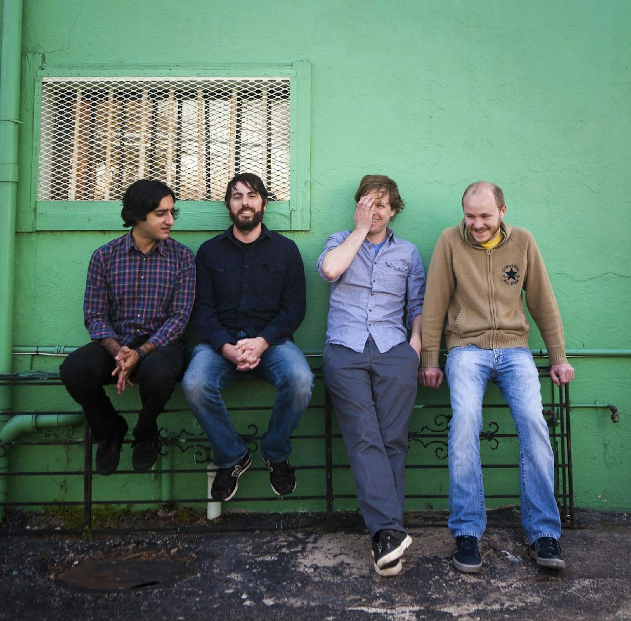Texas rockers Explosions in the Sky grew up in "Friday Night Lights" country — but "we were the guys getting beat up by the football players," joked guitarist/bassist Michael James, shown at right with bandmates Munaf Rayani, Mark Smith and Chris Hrasky.