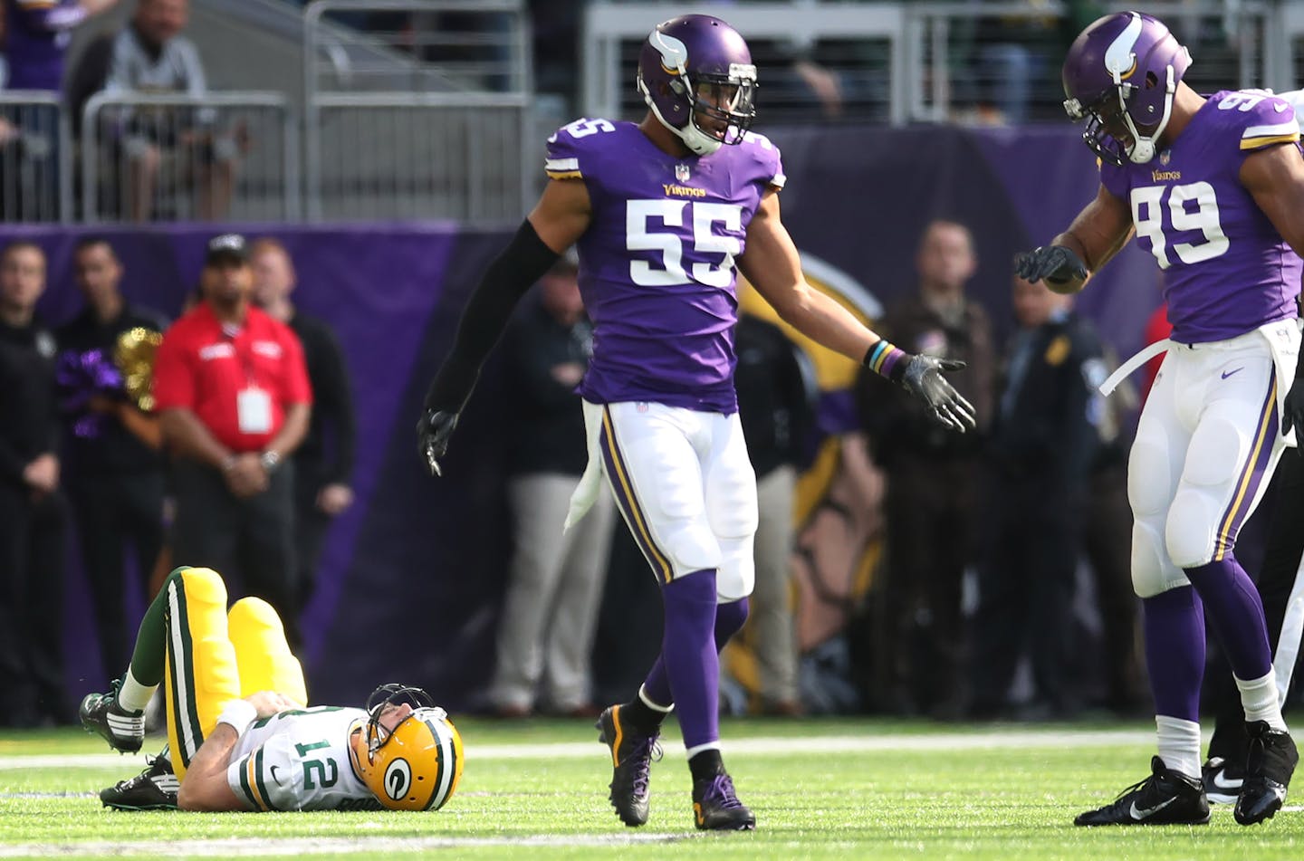 Minnesota Vikings outside linebacker Anthony Barr (55) celebrates with Danielle Hunter as Green Bay Packers quarterback Aaron Rodgers (12) lays on the field after he tackled him in the first quarter on Sunday, Oct. 15, 2017 at U.S. Bank Stadium in Minneapolis, Minn. (Jerry Holt/Minneapolis Star Tribune/TNS) ORG XMIT: 1213353