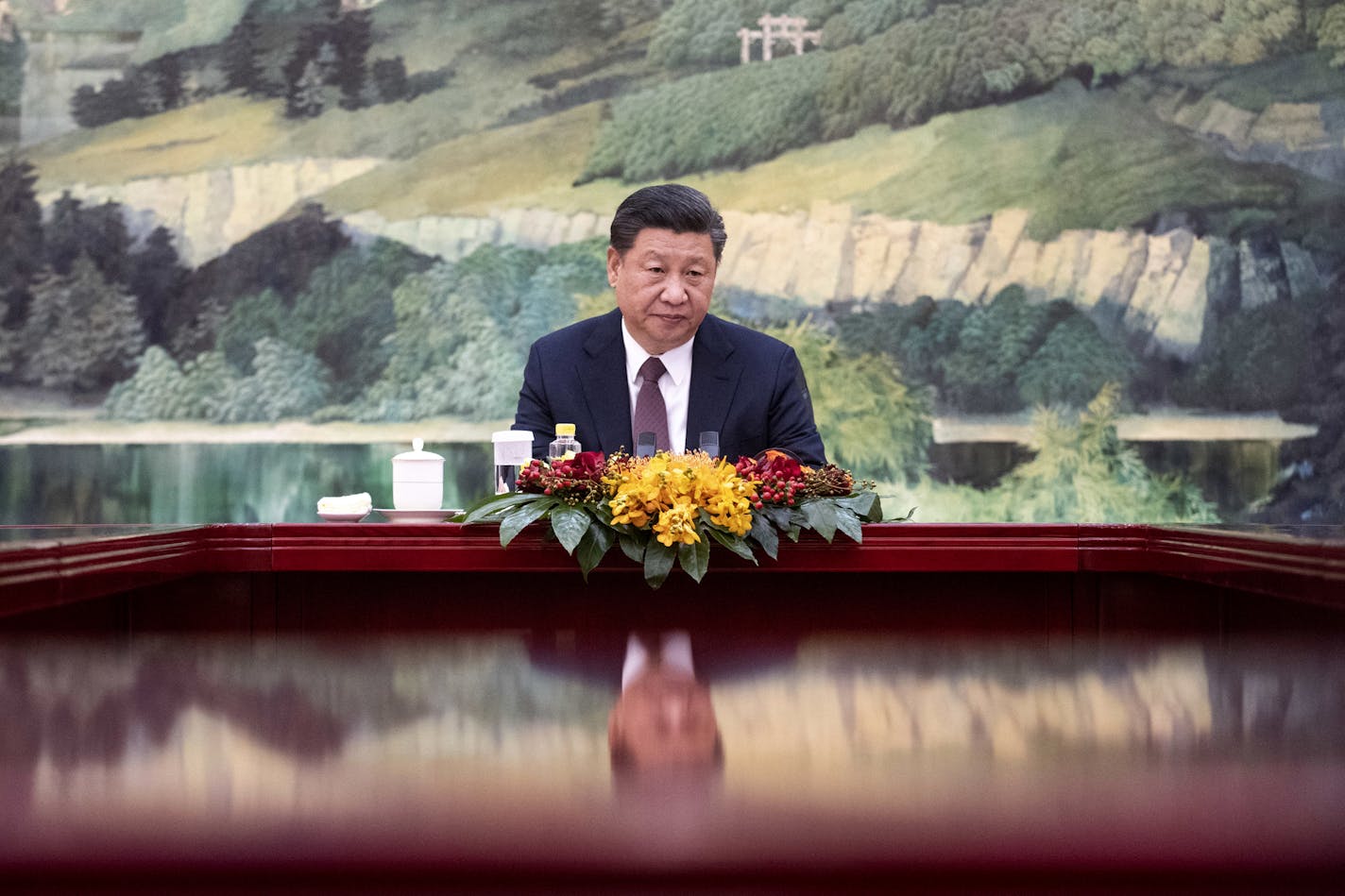 China's President Xi Jinping attends a meeting with North Korean Foreign Minister Ri Yong Ho at the Great Hall of the People in Beijing, Friday, Dec. 7, 2018. North Korea's foreign minister said his country remains committed to ending its nuclear weapons program in talks Friday with his Chinese counterpart, according to China's foreign ministry. (Fred Dufour/Pool Photo via AP)