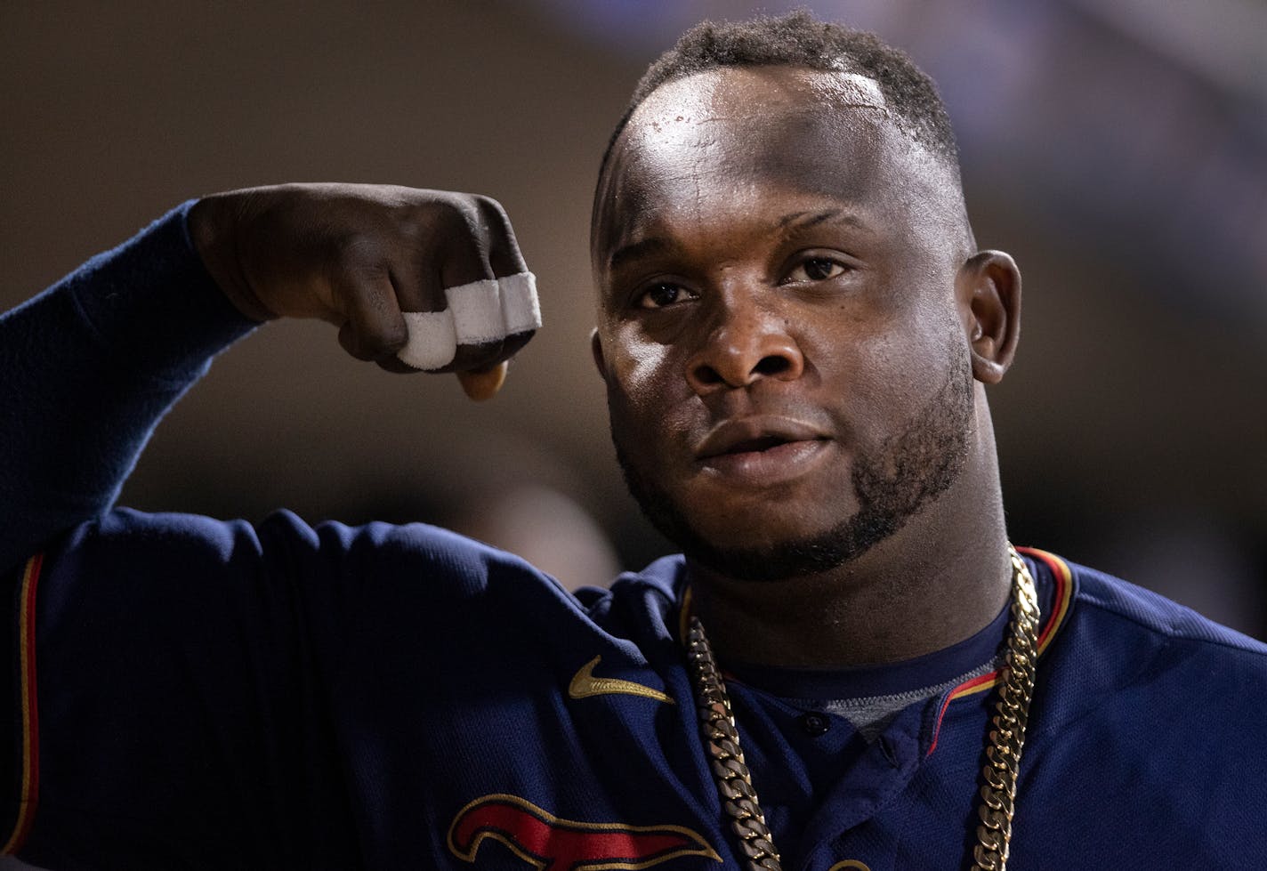 Minnesota Twins Miguel Sano (22) flexed in the dugout after hitting a homerun in the seventh inning.