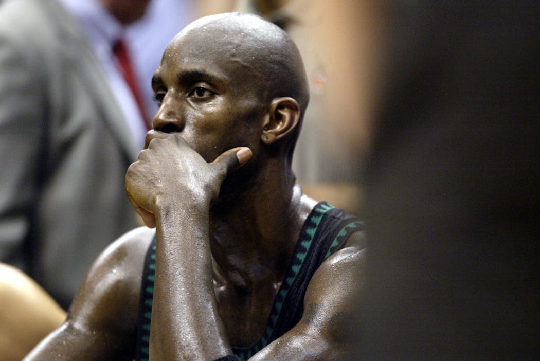 Kevin Garnett sat on the bench towards the end of the Timberwolves Game 6 loss to the Lakers in the first round of the 2003 playoffs.