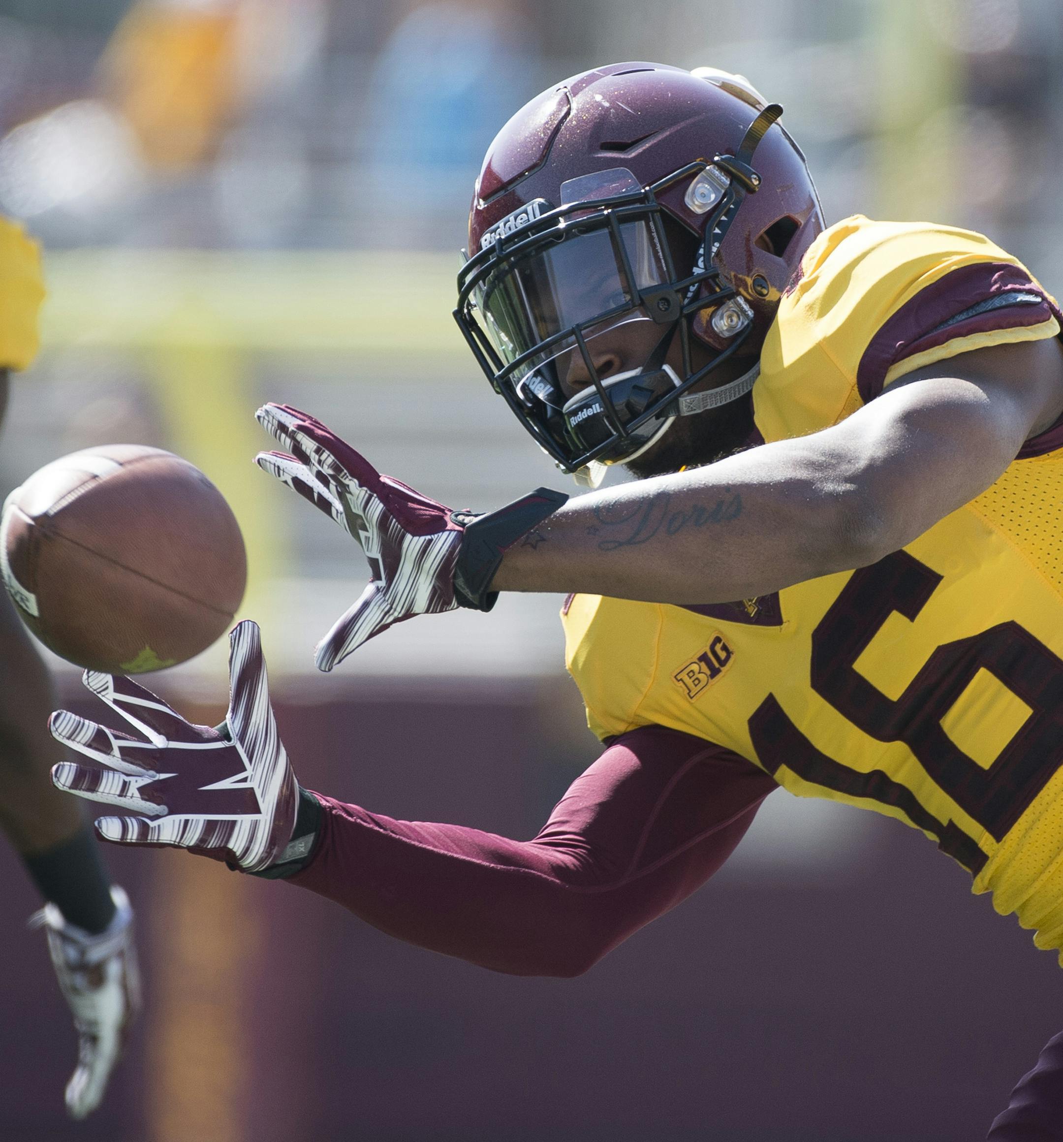 University of Minnesota running back Jeff Jones (16) makes a practice catch before Saturday's scrimmage. ] (Aaron Lavinsky | StarTribune) aaron.lavinsky@startribune.com The University of Minnesota football team participates in its annual spring game on Saturday, April 11, 2015 at TCF Bank Stadium in Minneapolis.
