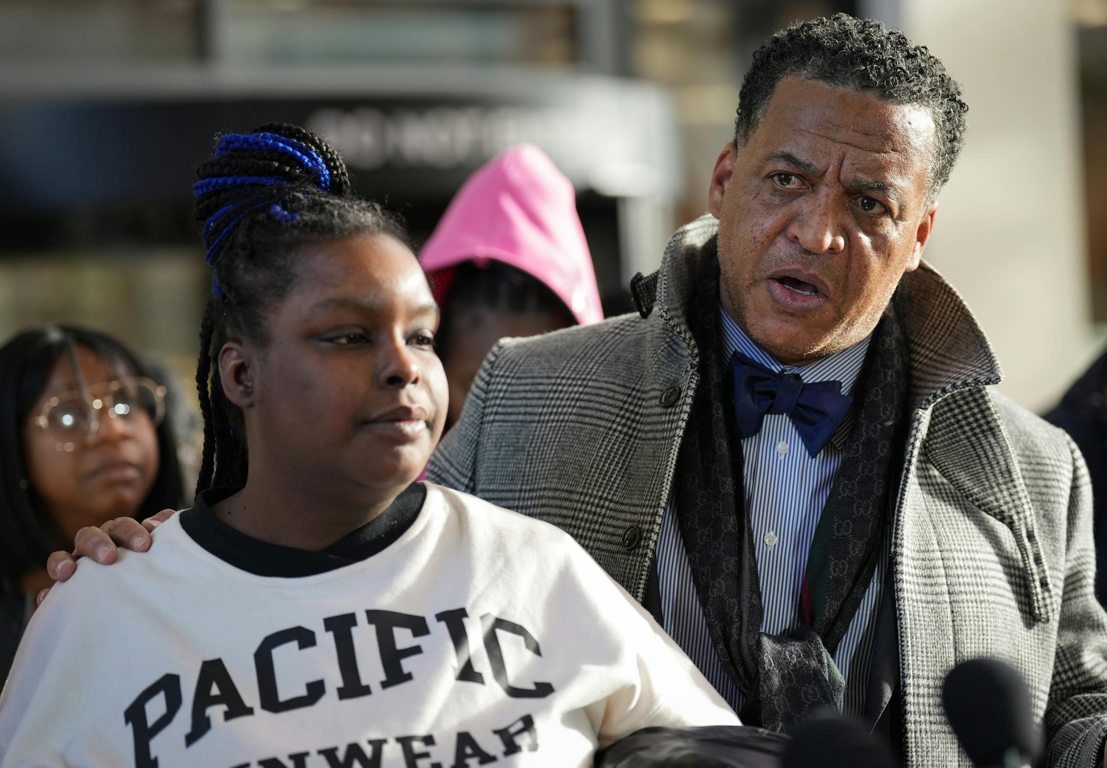 Attorney William Walker stands with Deshaun Hill Jr.'s mother, Tuesday Sheppard, while they address the media after a guilty verdict for Deshaun's murder, Thursday, January 26, 2023, at the Hennepin County Government Center. Cody Fohrenkam was found guilty of two counts of second-degree murder in the Feb. 9, 2022 shooting of Hill after the two randomly crossed paths on a north Minneapolis sidewalk while Hill walked to the bus stop.