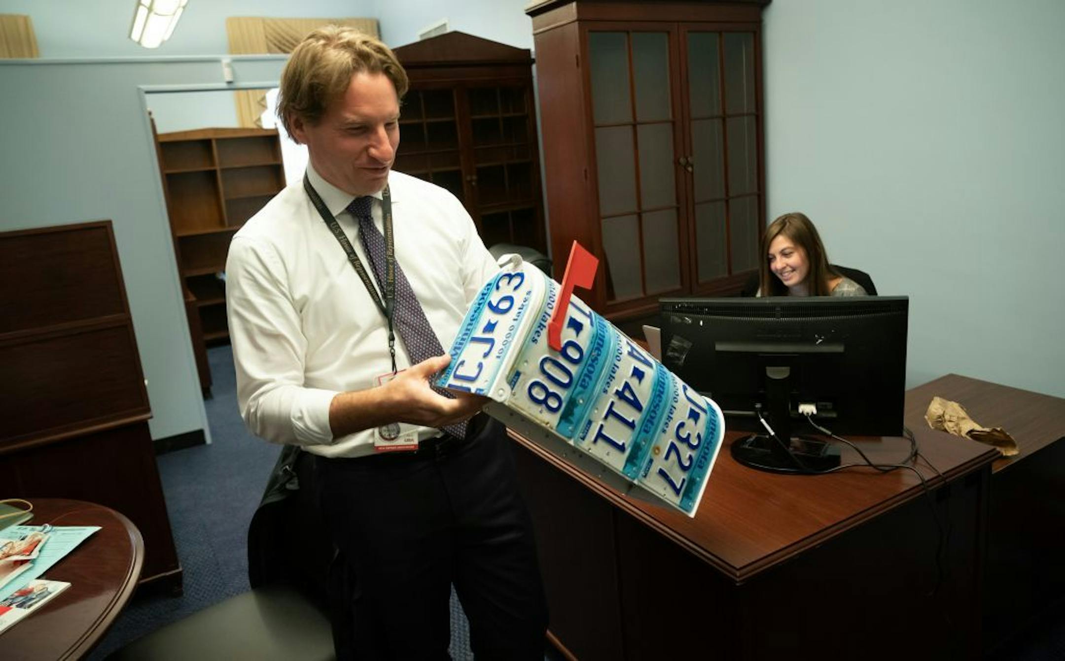 Congressman-elect Dean Phillips tried to figure out where some of his Minnesota memorabilia would go in his new congressional office in the Longworth House Office Building in Washington, D.C. He was just allowed to start moving into the new office earlier in the day. He and the other members will be sworn in Thursday. This was a mailbox he purchased at the Minnesota State Fair.
