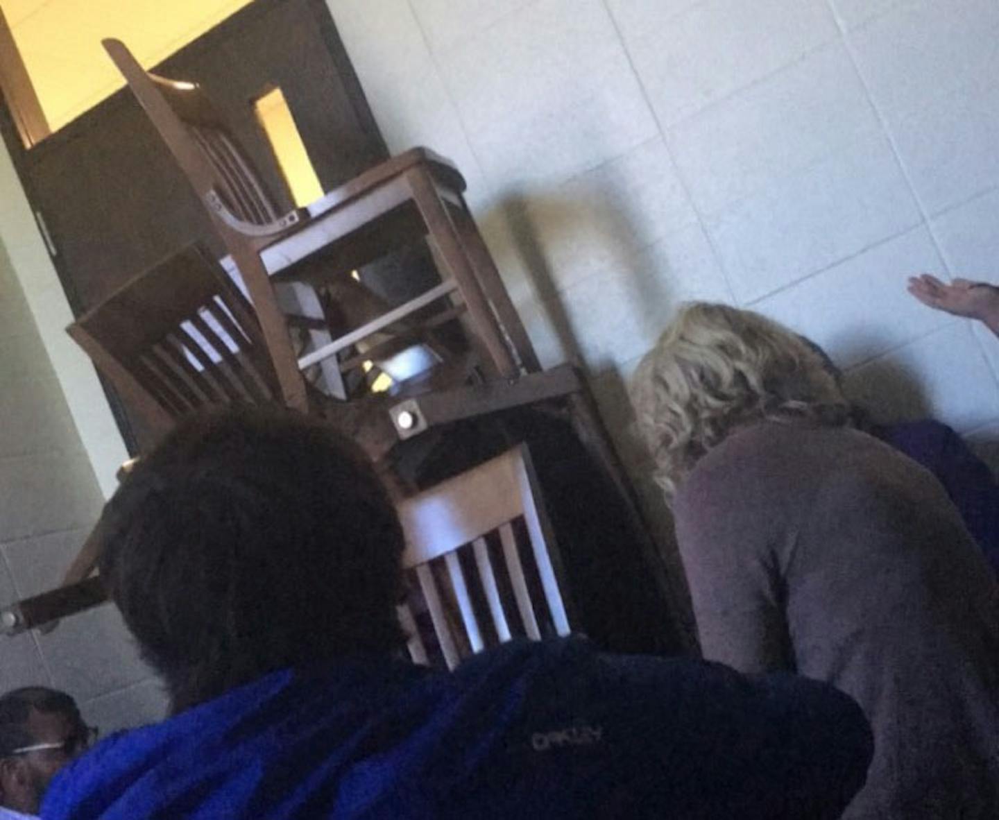 In this cell phone photo taken by Normandale Community College student Maggie Pekarna, a classroom waits is in lockdown about noon Wednesday during a police incident.