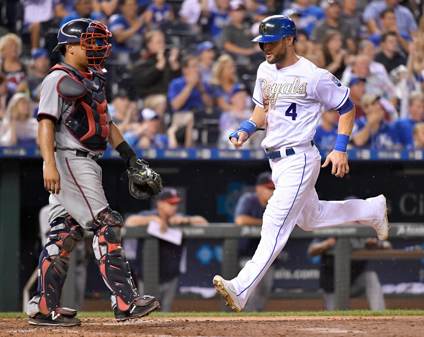 Kansas City Royals' Alex Gordon scores in front of Minnesota Twins catcher Juan Centeno on a single by Jarrod Dyson in the fourth inning during Friday's baseball game on August 19, 2016 at Kauffman Stadium in Kansas City, Mo. (John Sleezer/Kansas City Star/TNS) ORG XMIT: 1188951