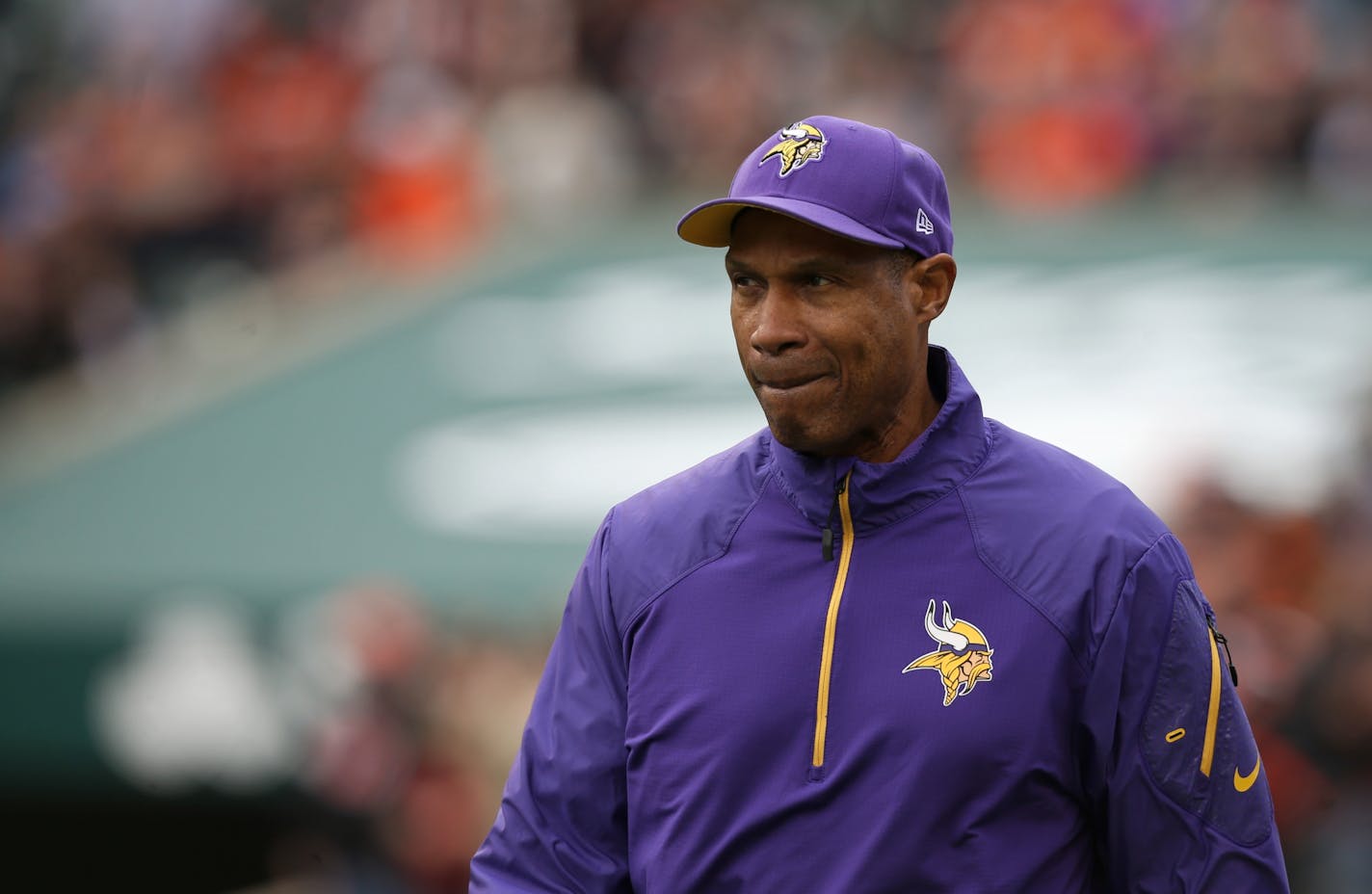 Head coach Leslie Frazier walked on the field as the Vikings were introduced at the start of the game against the Cincinnati Bengals.