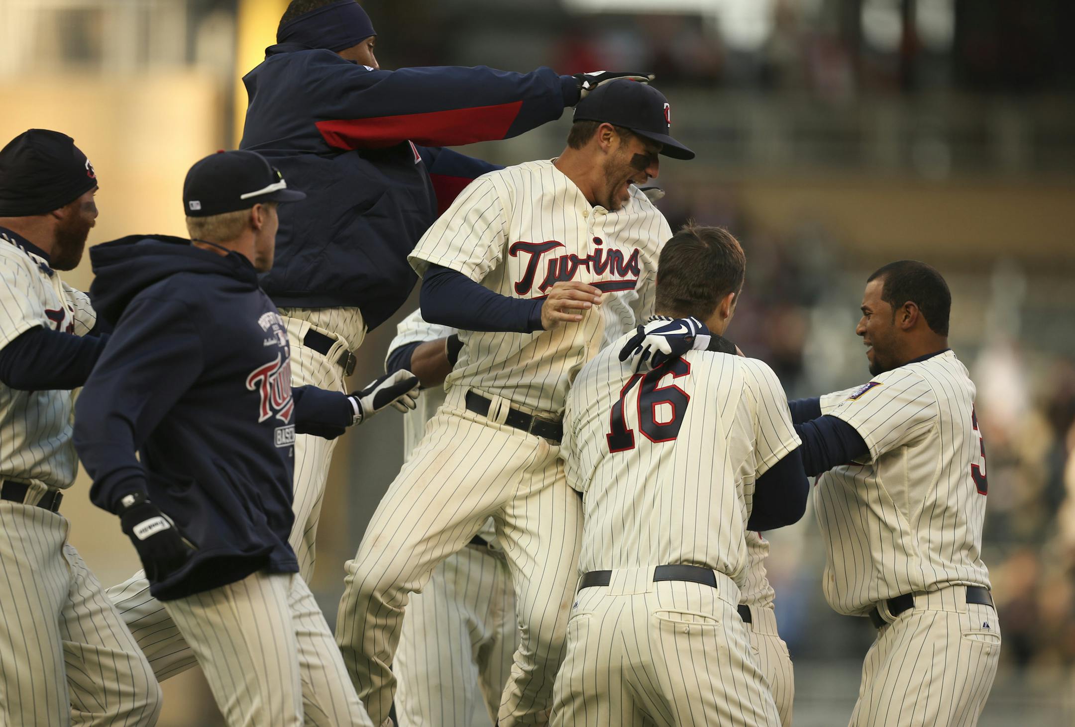 The Minnesota Twins beat the Detroit Tigers 3-2 in their second game of the season Wednesday afternoon, April 3, 2013 at Target Field in Minneapolis, Minn. The Twins' Eduardo Escobar was mobbed by teammates in celebration after Escobar gave the Twins their first win with a 2 RBI double to deep left center with one out in the bottom of the ninth. ] JEFF WHEELER ‚Ä¢ jeff.wheeler@startribune.com