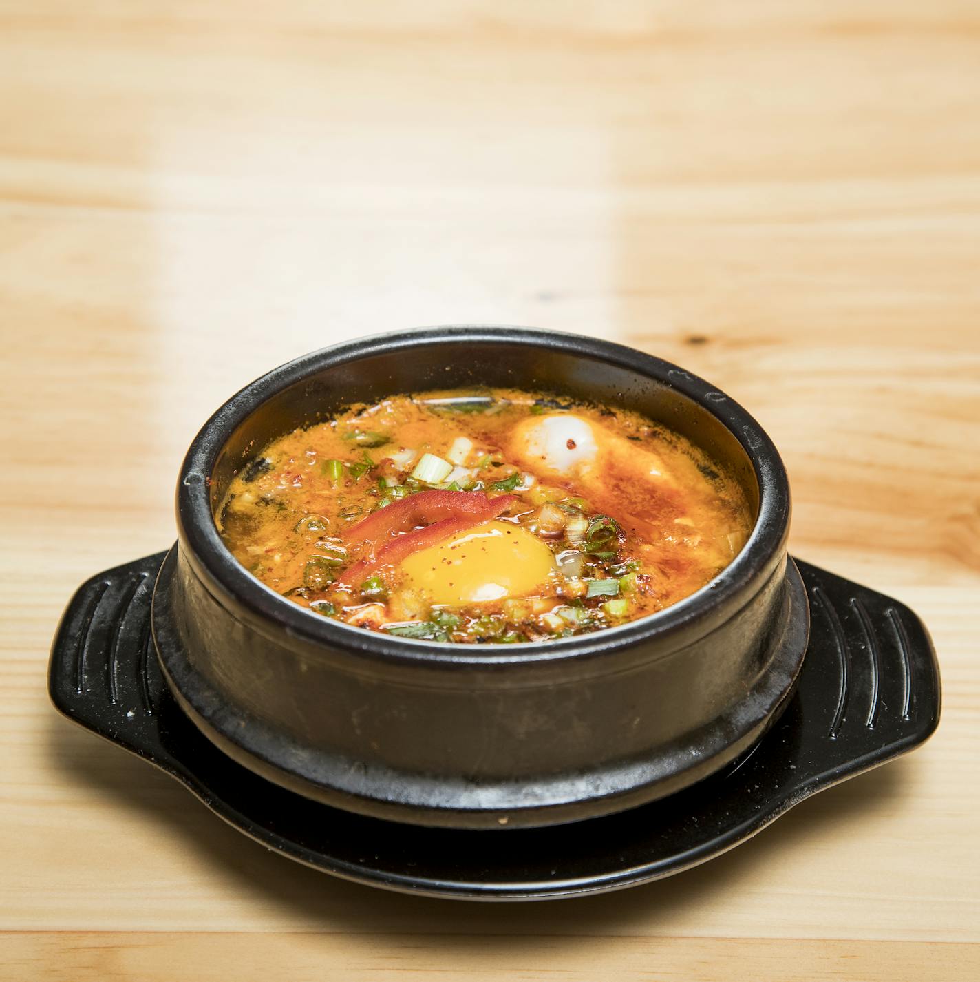 Sundubu at K-bop Korean Bistro in Minneapolis. ] CARLOS GONZALEZ cgonzalez@startribune.com - December 8, 2016, Minneapolis, MN, A look at a favorite Korean dish, sundubu, and a new crop of Korean cookbooks, along with roster of the best Korean restaurants, K-bop will prepare their version of sundubu.