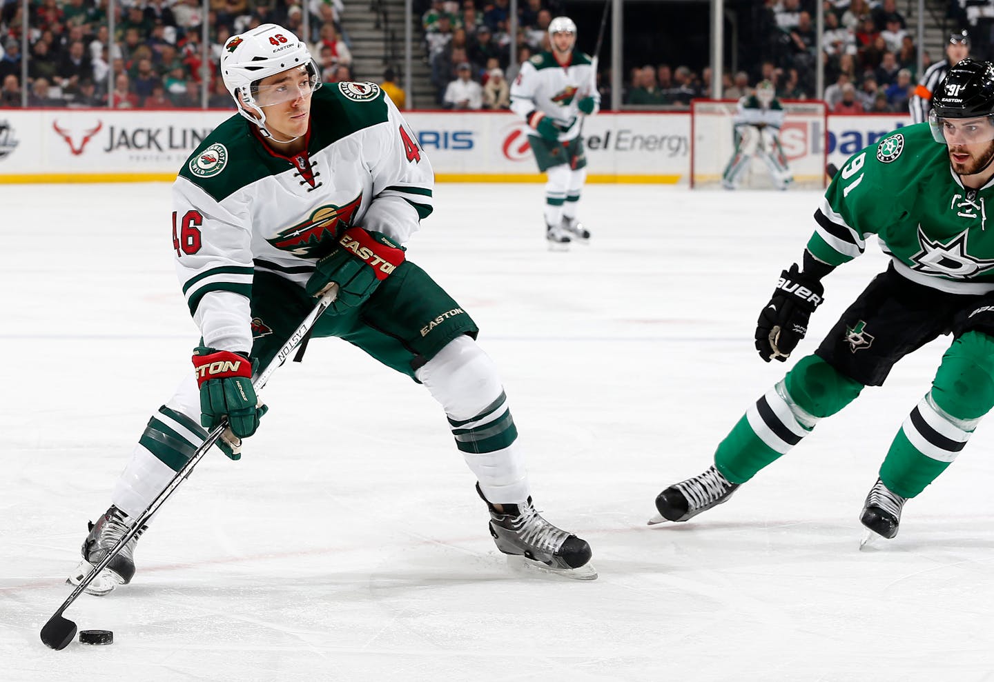 Minnesota Wild's Jared Spurgeon (46) prepares to the shoot the puck past Dallas Stars goalie Kari Lehtonen for a goal during the first period on Monday, Dec. 21, 2015, at Xcel Energy Center in St. Paul, Minn.