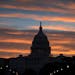 FILE - The morning sun illuminates clouds behind the U.S. Capitol in Washington, Monday, Sept. 30, 2013. Republicans, Democrats and bureaucrats are st