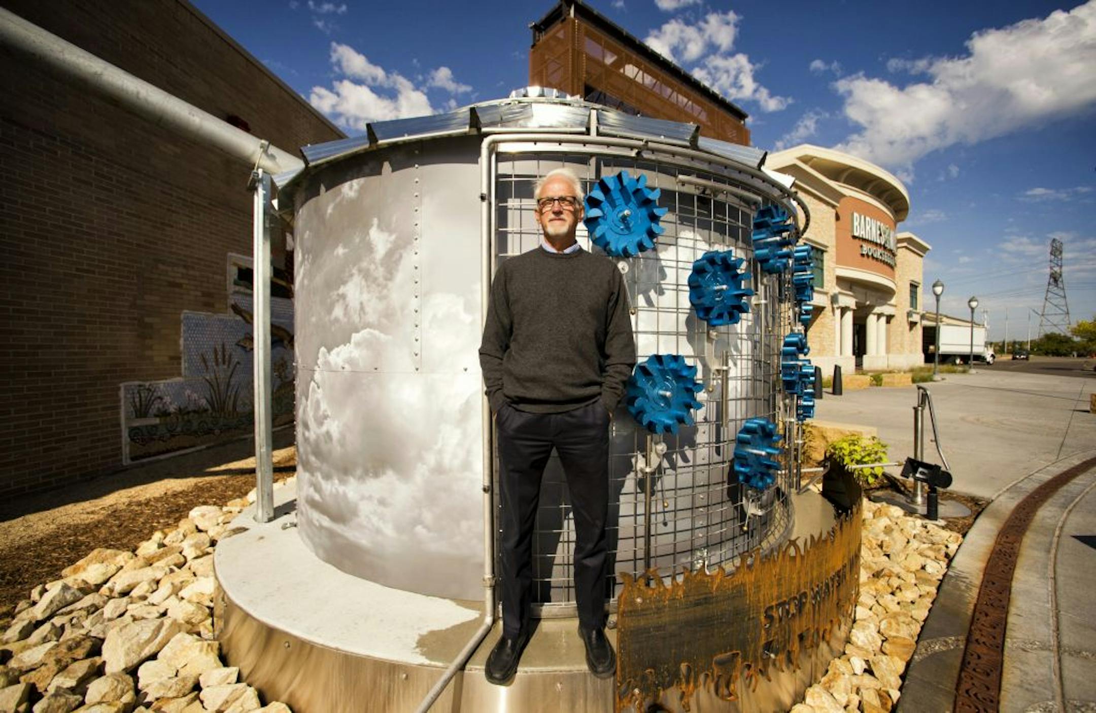 Cliff Aichinger is the force behind the new storm-water management system at Maplewood Mall. This cistern collects rain runoff from the roof.