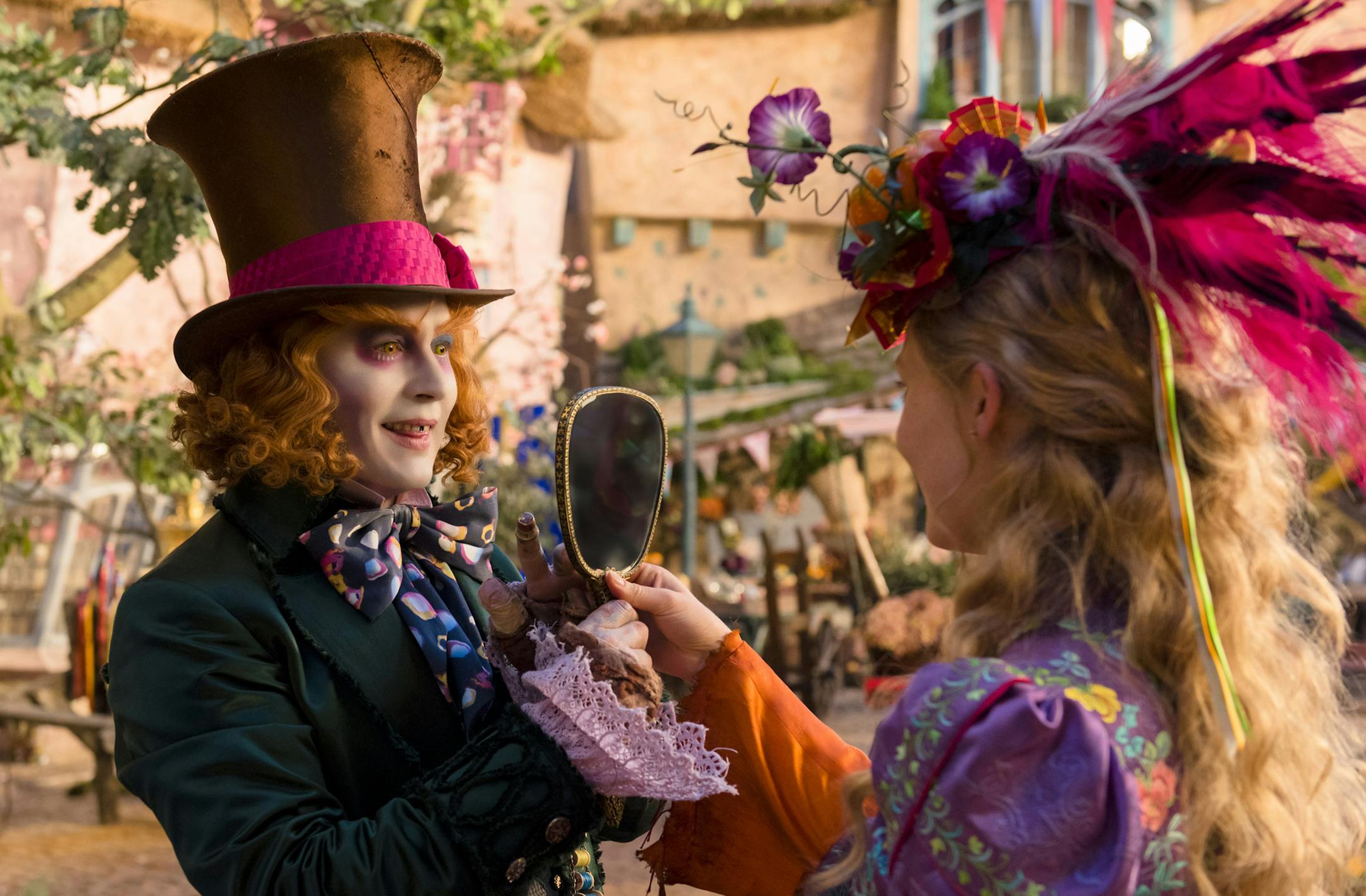Johnny Depp and Mia Wasikowska in “Alice Through the Looking Glass.”