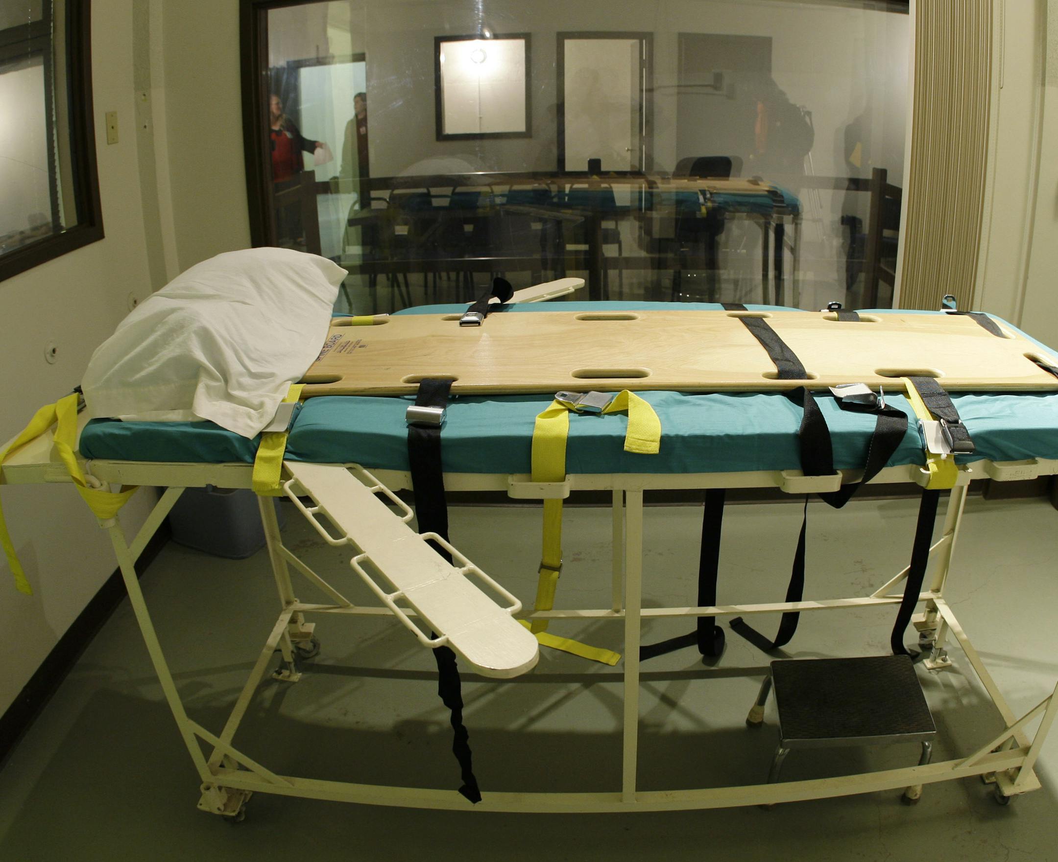 FILE - In this Nov. 20, 2008 file photo, the execution chamber at the Washington State Penitentiary is shown with the witness gallery behind glass in the background, in Walla Walla, Wash. Gov. Jay Inslee announced Tuesday, Feb. 11, 2014, that he is suspending the use of the death penalty in Washington state, but the moratorium does not commute the sentences of people currently condemned to death. (AP Photo/Ted S. Warren, File) ORG XMIT: WATW201