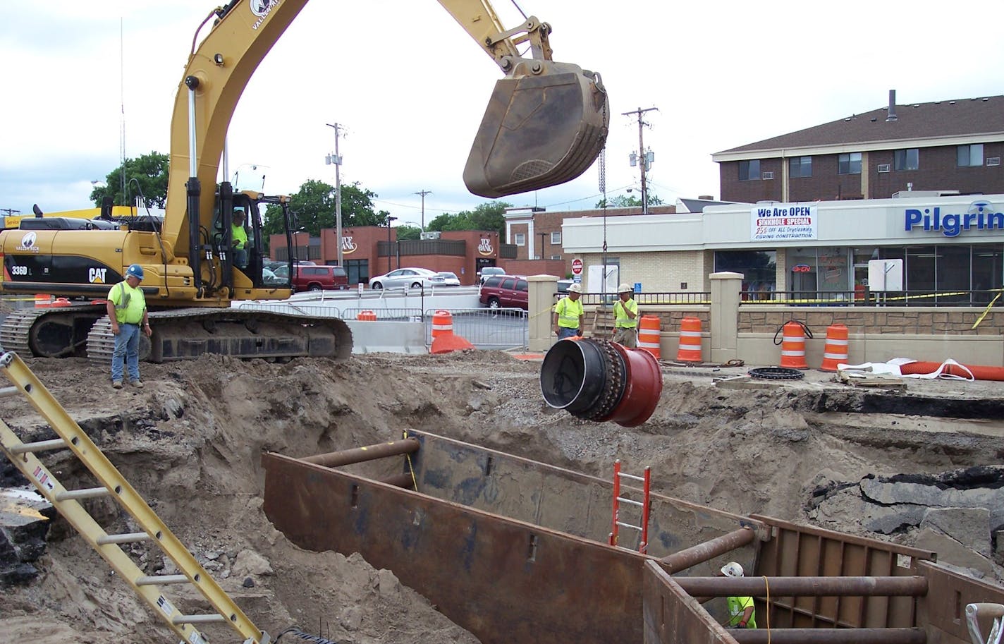 A combination of municipal workers and contractors worked for three weeks to repair the hole left by the water main break in downtown Robbinsdale