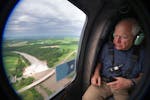 Gov. Tim Walz flies over the Rapidan Dam in southern Minnesota on June 25.