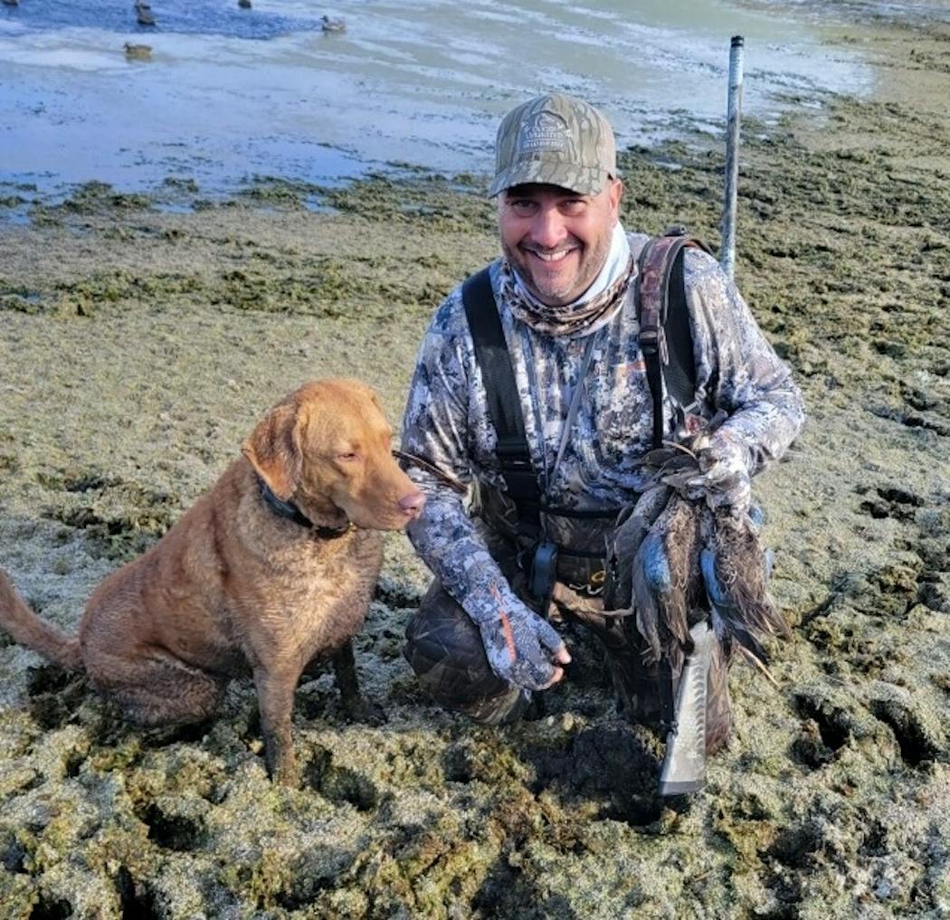 Pete Bohlig of Farmington and his Chesapeake Bay retriever, Penny, managed to bag eight teal on Saturday’s duck opener, hunting on a state wildlife management area in western Minnesota. Bohlig was hunting with Win Mitchell.