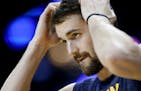 Cleveland Cavaliers forward Kevin Love warms up before an NBA basketball game in New Orleans, Friday, Dec. 12, 2014. (AP Photo/Jonathan Bachman) ORG X