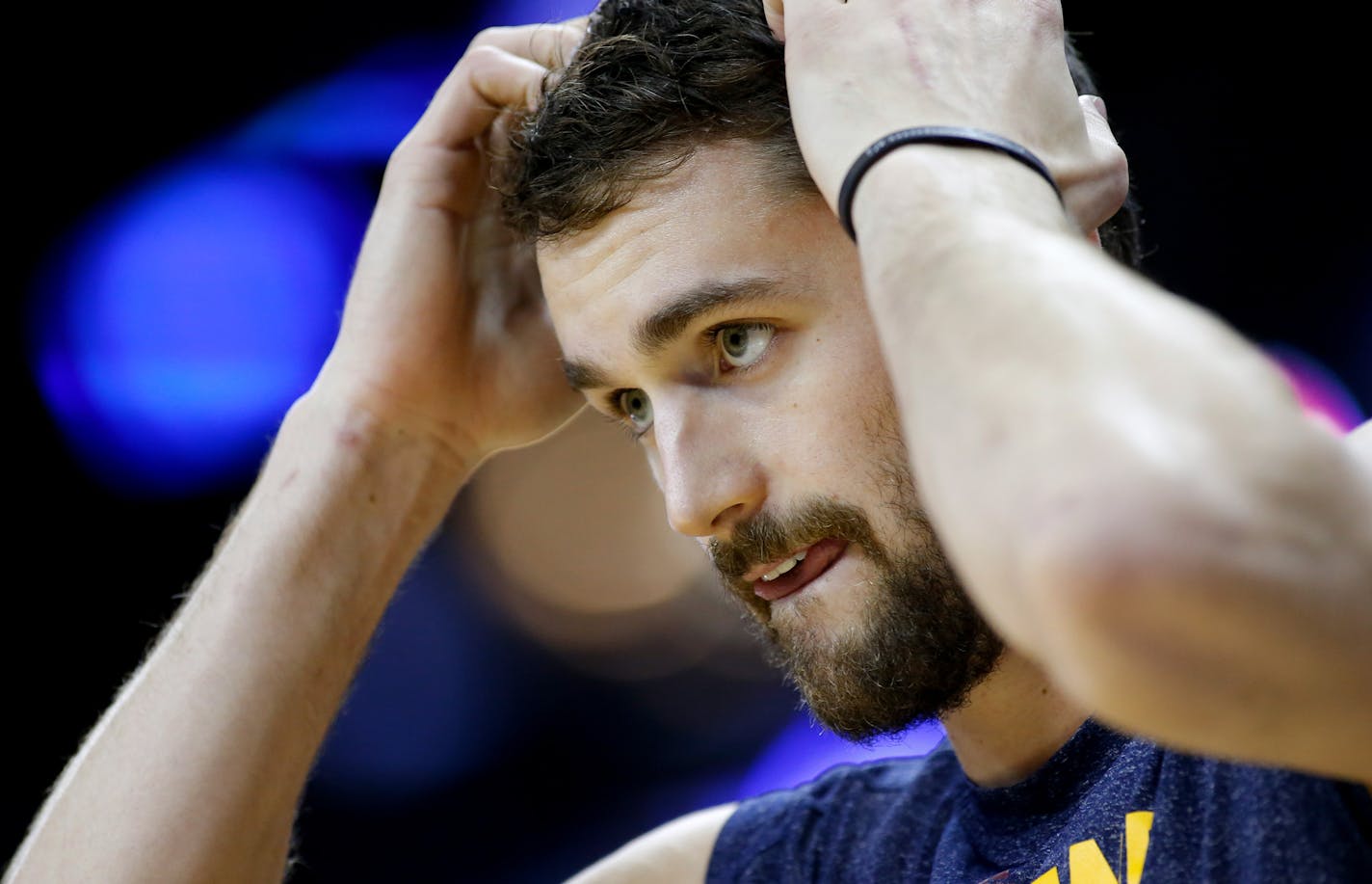 Cleveland Cavaliers forward Kevin Love warms up before an NBA basketball game in New Orleans, Friday, Dec. 12, 2014. (AP Photo/Jonathan Bachman) ORG XMIT: NYOTK