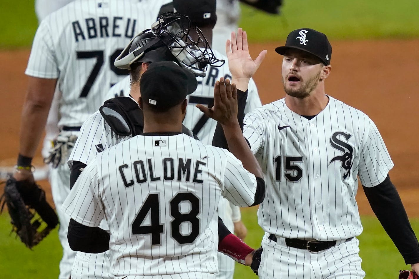 The White Sox's Adam Engel (15) celebrated with catcher Yasmani Grandal and reliever Alex Colome after Chicago's 3-1 victory over the visiting Twins on Monday. Engel delivered the go-ahead run with a pinch RBI single in the eighth inning, and Colome got the final four outs for the win.