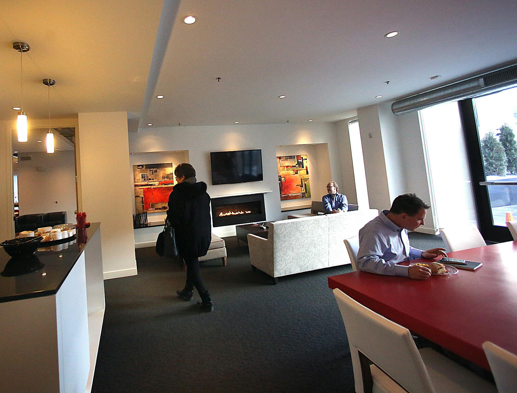 Residents and managers from BrunsfieldNorthloop apartments recently gathered for a luncheon at new boutique apartment developed by a Malaysian company on Washington Ave. Among amenities in the building is a community room on the ground floor. ] JIM GEHRZ &#x201a;&#xc4;&#xa2; jgehrz@startribune.com / Minneapolis, MN / January 8, 2014 / 11:30 AM BACKGROUND INFORMATION: Managers of the Brunsfield will be holding a luncheon for residents of the building, a new boutique apartment developed by a Malay