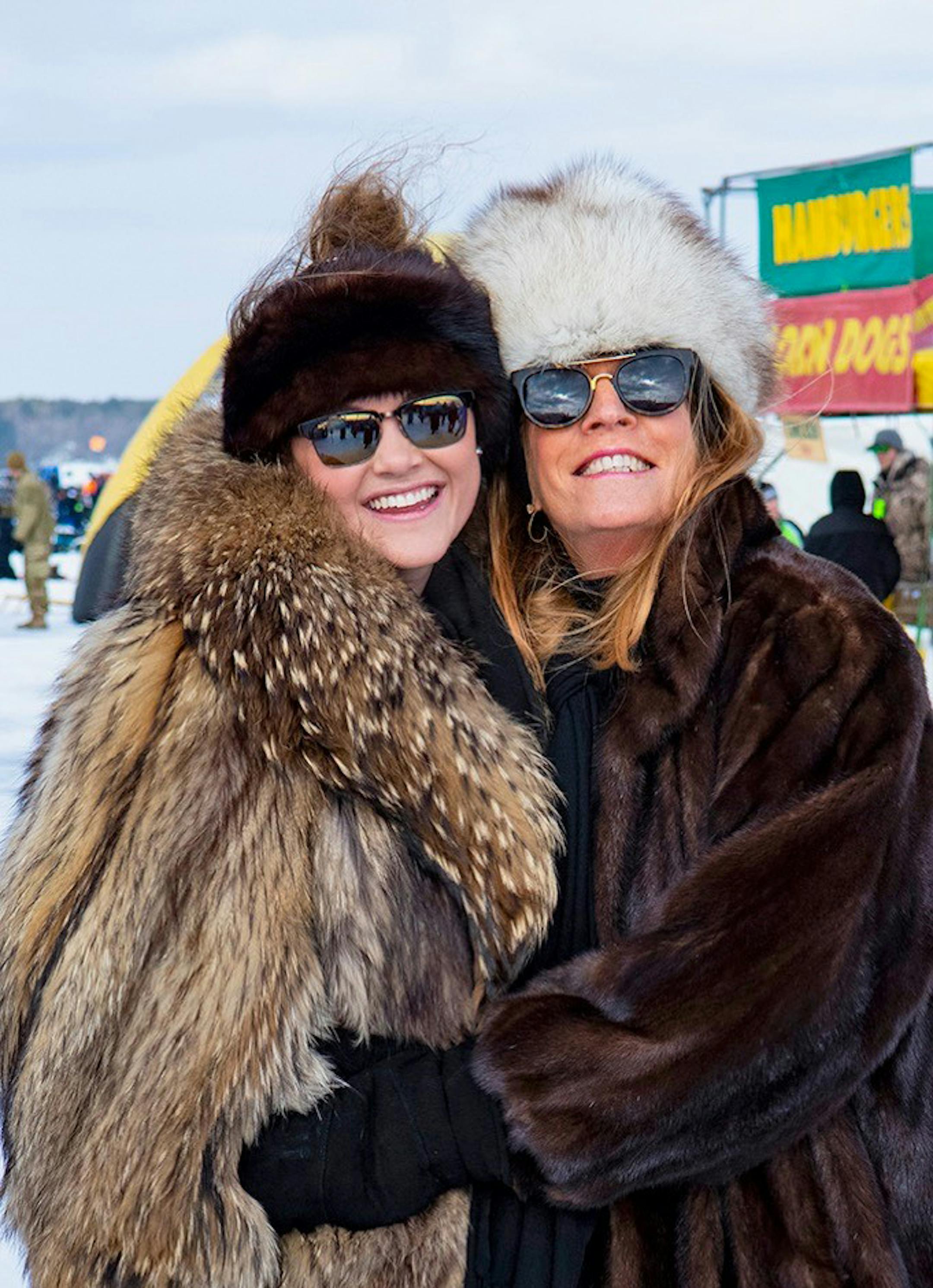 Grace Mason of Denver, Colo., left, and her aunt, Claudia Allene, who lives on Gull Lake, site of the Brainerd Jaycees $150,000 Ice Fishing Extravaganza, are regular, fur coat-wearing attendees of the event — though they don't fish.