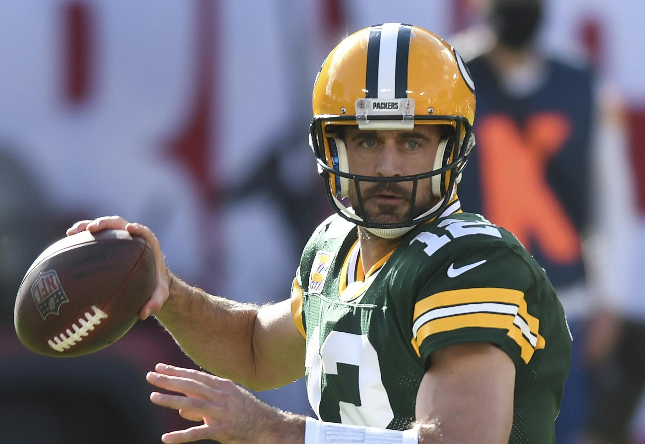 Green Bay Packers quarterback Aaron Rodgers (12) throws a pass against the Tampa Bay Buccaneers during the first half of an NFL football game Sunday, Oct. 18, 2020, in Tampa, Fla. (AP Photo/Jason Behnken)