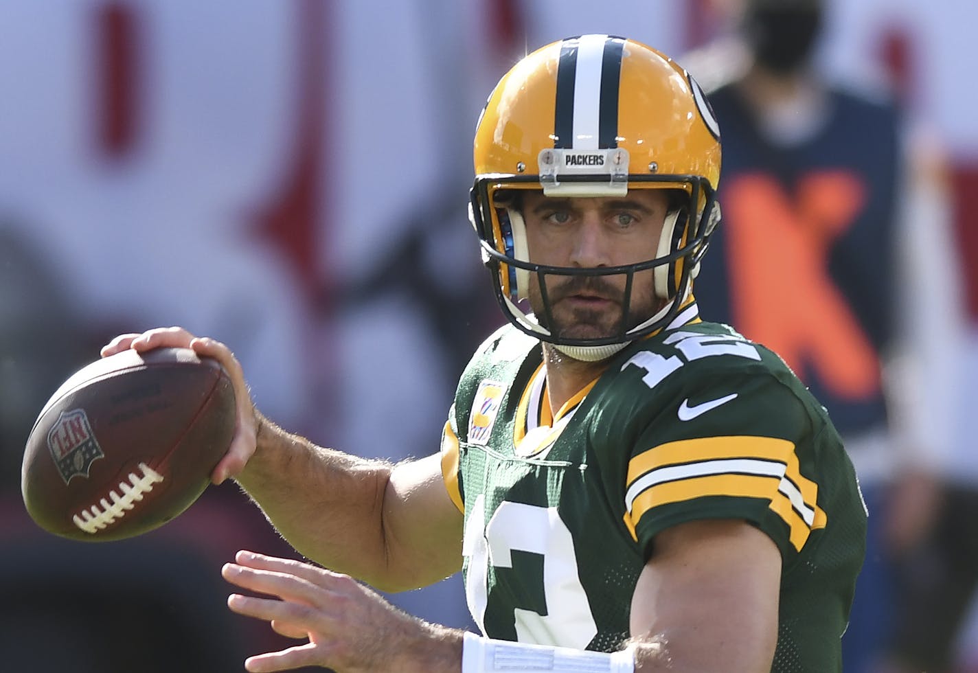 Green Bay Packers quarterback Aaron Rodgers (12) throws a pass against the Tampa Bay Buccaneers during the first half of an NFL football game Sunday, Oct. 18, 2020, in Tampa, Fla. (AP Photo/Jason Behnken)