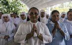 Nuns pray at a mass funeral at St. Sebastian&#x2019;s Church in Negombo, Sri Lanka, on Tuesday, April 23 2019. The Islamic State claimed responsibilit