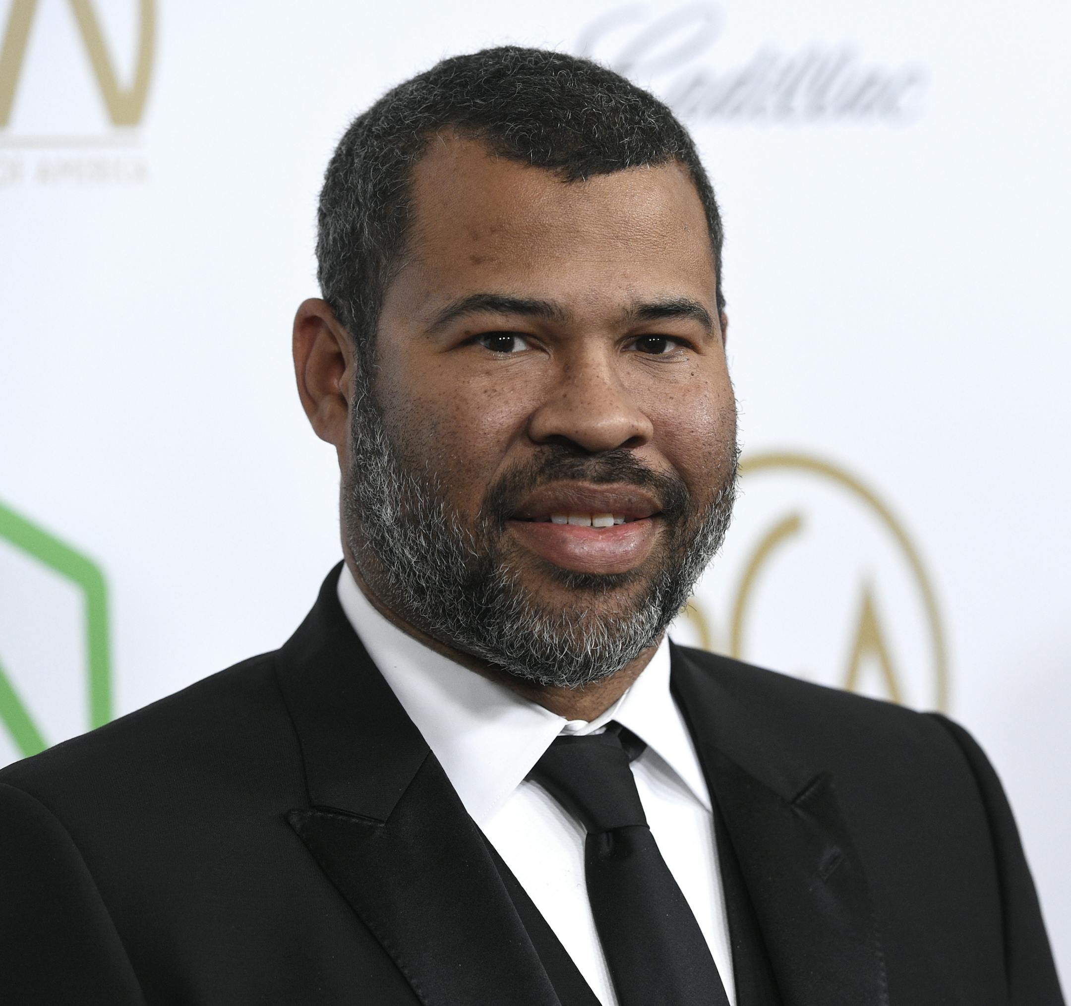 Jordan Peele arrives at the Producers Guild Awards on Saturday, Jan. 19, 2019, at the Beverly Hilton Hotel in Beverly Hills, Calif. (Photo by Chris Pizzello/Invision/AP)