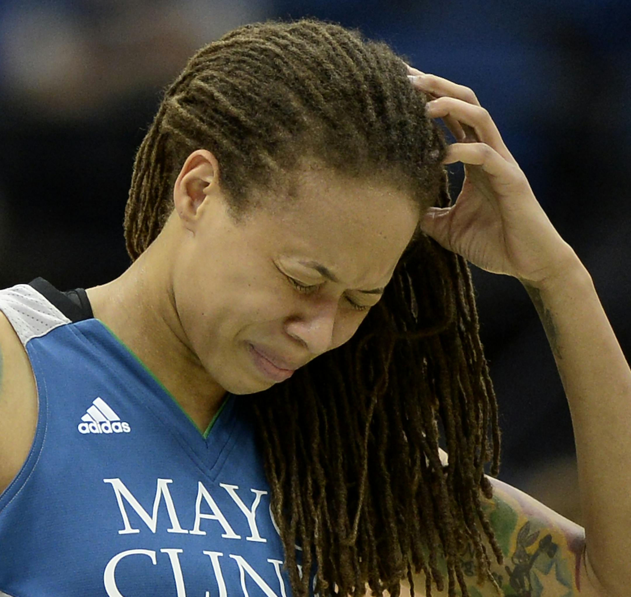 Minnesota Lynx guard Seimone Augustus (33) was helped off the court after sustaining a head injury in the third quarter Tuesday against the Phoenix Mercury. ] (AARON LAVINSKY/STAR TRIBUNE) aaron.lavinsky@startribune.com The Minnesota Lynx play the Phoenix Mercury on Tuesday, June 7, 2016 at Target Center in Minneapolis, Minn.