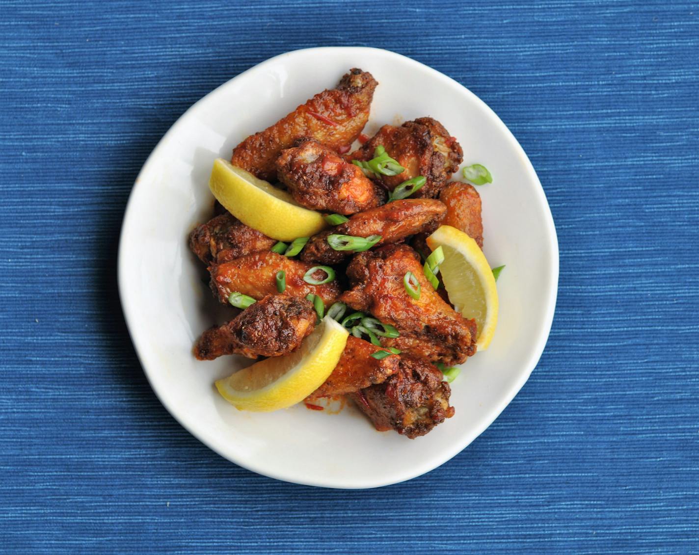 Try Harissa Honey Chicken Wings for Super Bowl Sunday. Credit: Meredith Deeds, Star Tribune