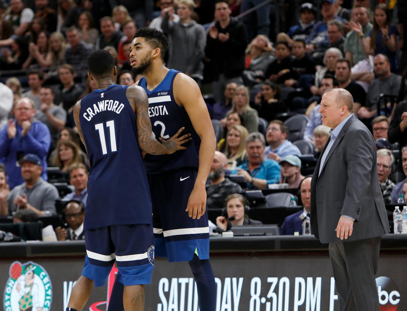 Karl-Anthony Towns, right, had to be held back by Wolves teammate Jamal Crawford after he was called for his second technical foul and ejected against the Jazz on March 2.