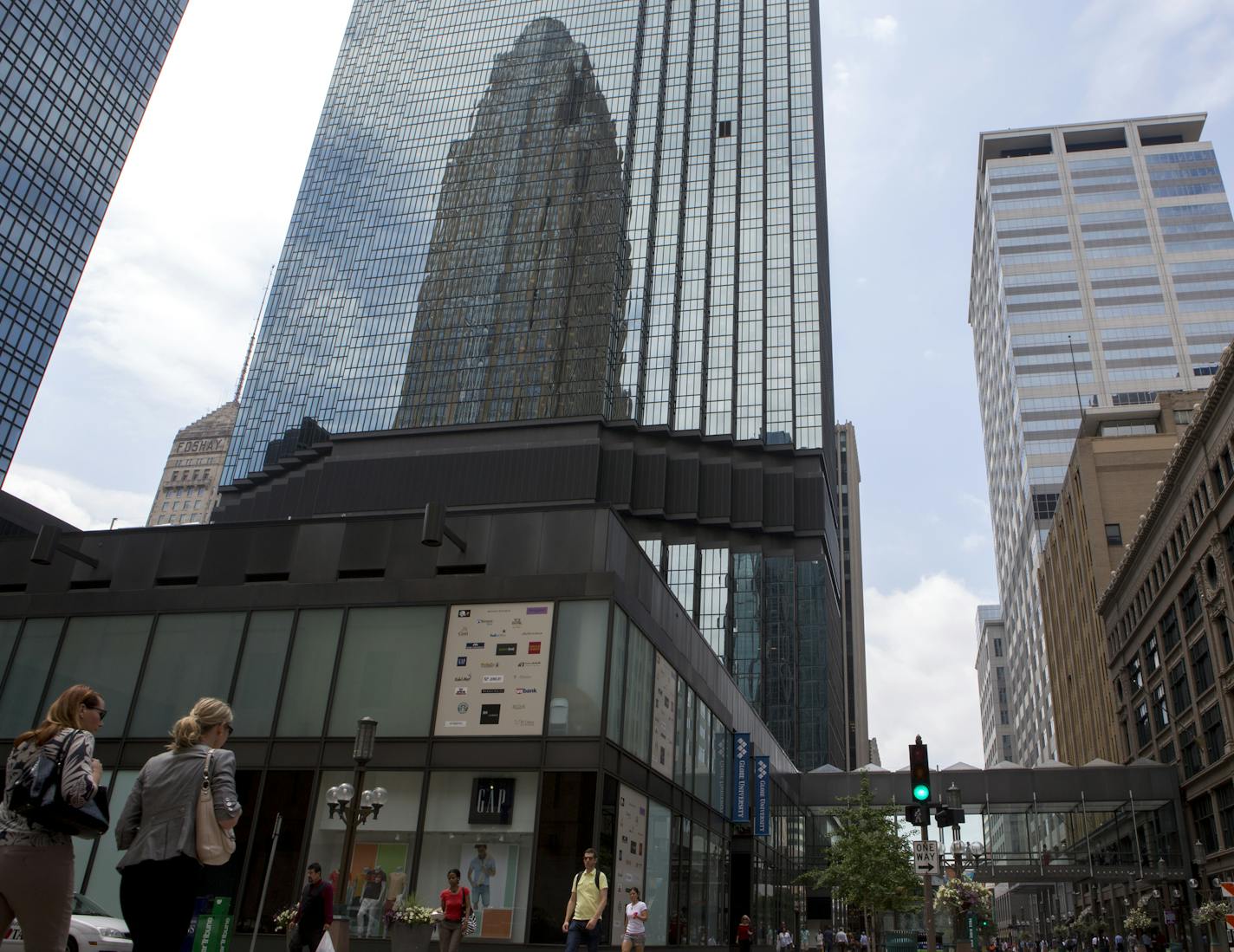 People walk by Gap at 7th and Nicollet Mall in Minneapolis, Minn., Monday, July 13, 2015. The IDS Center location of Gap is closing.] KAYLEE EVERLY kaylee.everly@startribune.com