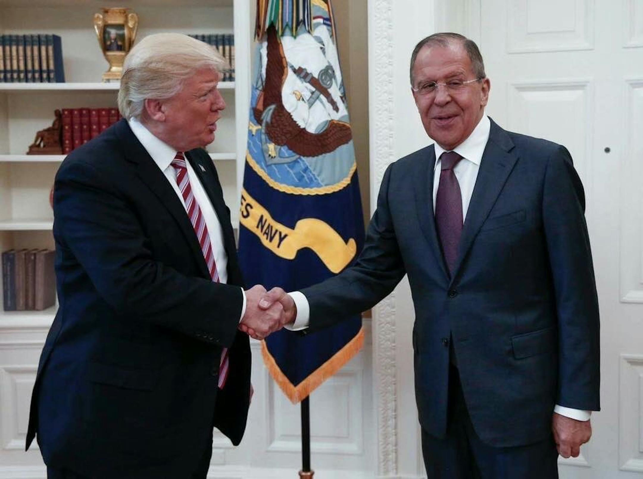 FILE - In this May 10, 2017 file handout photo released by the Russian Ministry of Foreign Affairs, President Donald Trump meets with Russian Foreign Minister Sergey Lavrov in the Oval Office of the White House in Washington. The U.S. and Israel are publicly brushing aside President Donald Trump’s reported sharing of a highly classified tip from Israel with Russia, but spy professionals on both sides are frustrated and fearful about the repercussions to a critical intelligence partnership