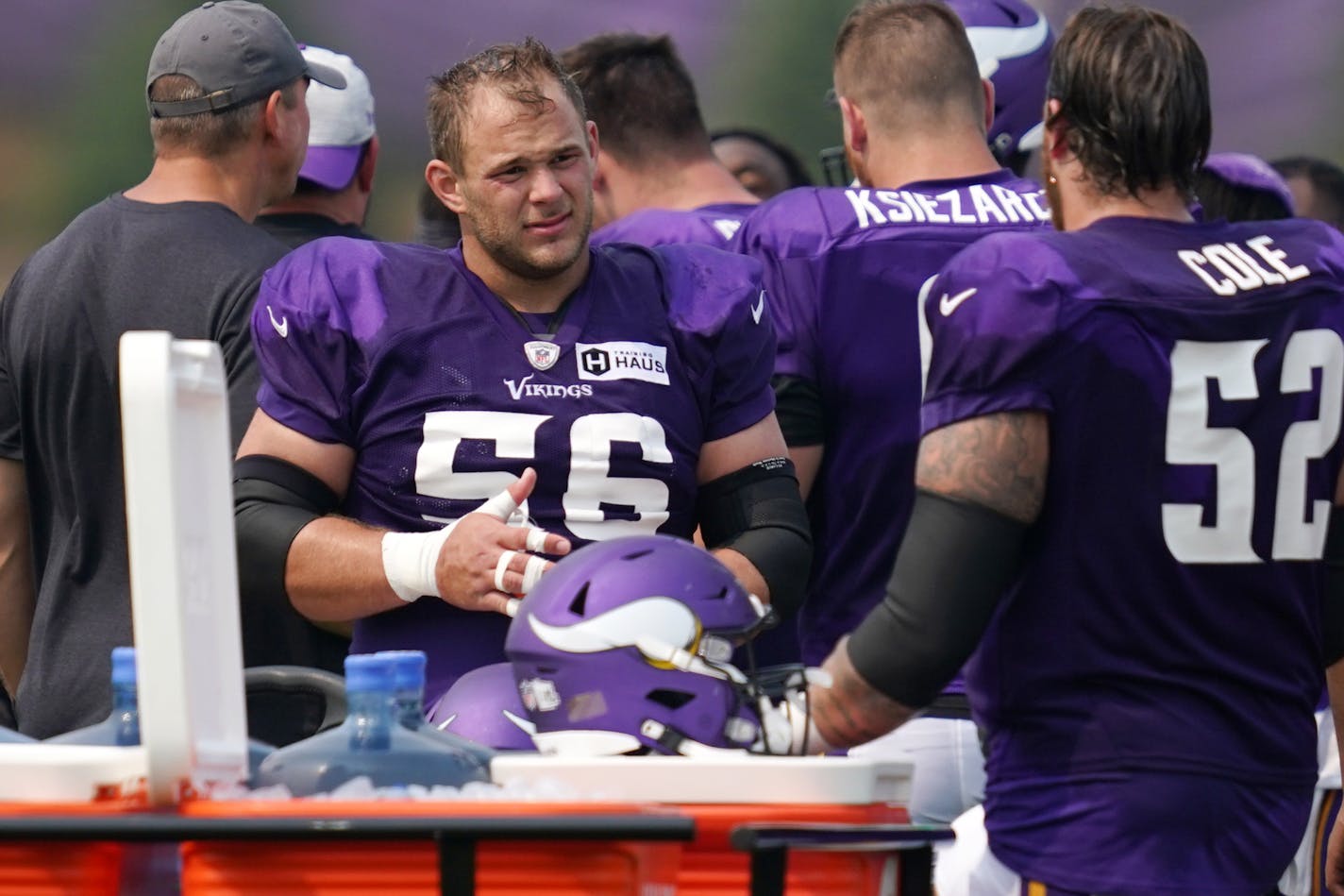 Vikings center Garrett Bradbury (56) talked with fellow center Mason Cole (52) during training camp Tuesday. ] ANTHONY SOUFFLE • anthony.souffle@startribune.com