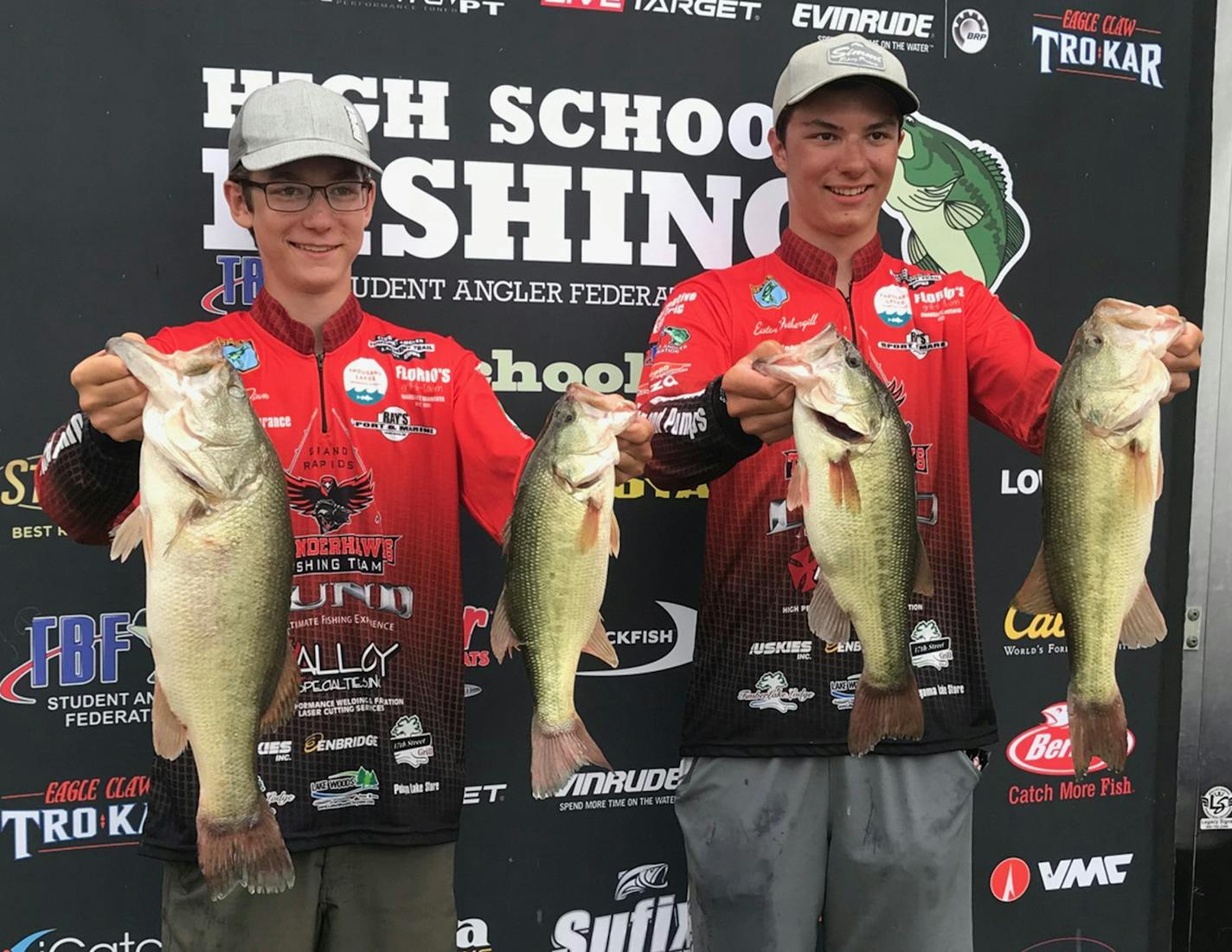 Alex Timm, left, and Easton Fothergill of Grand Rapids, Minn., with the largemouth bass that earned then national honors recently at a high school bass fishing tournament in Alabama.