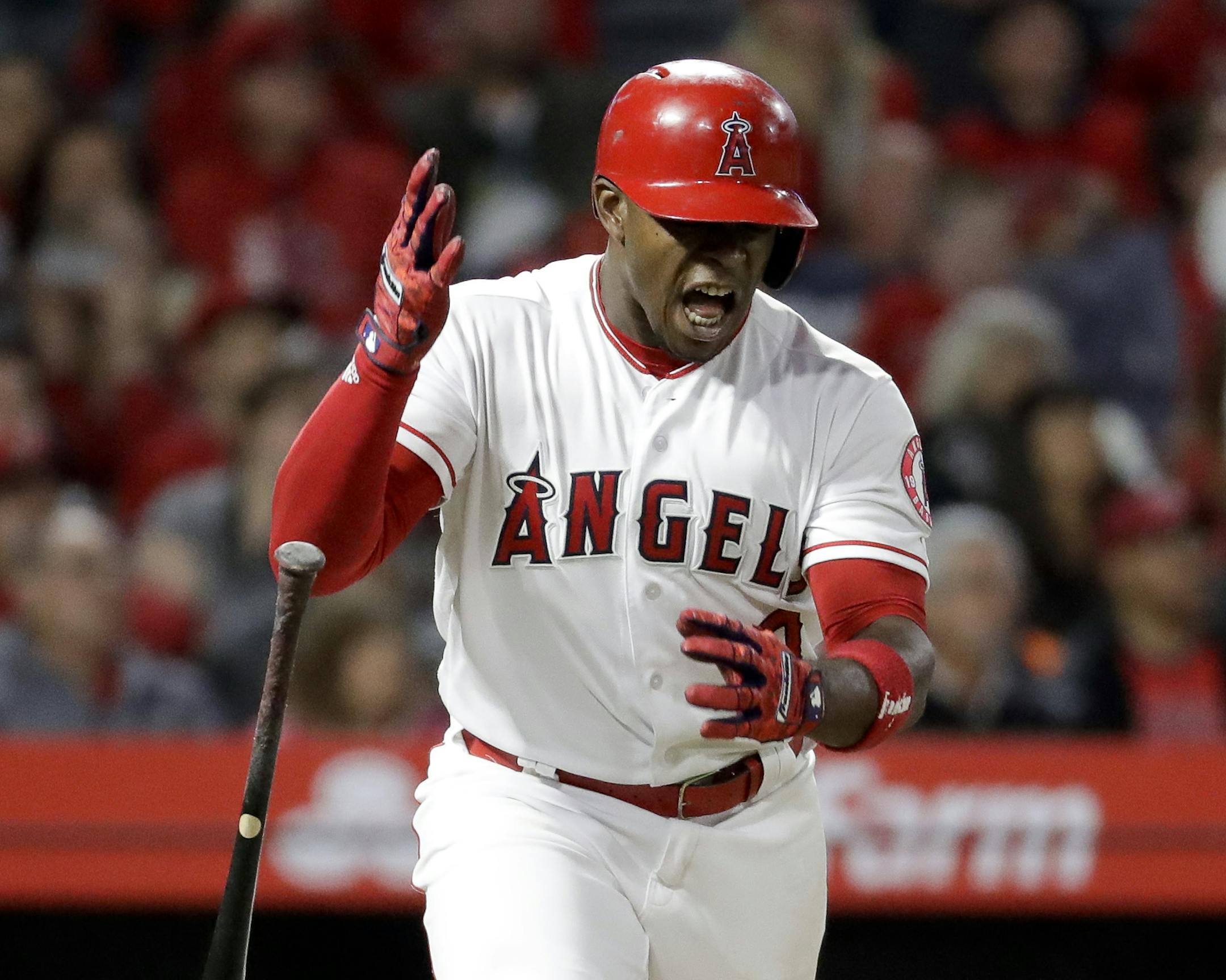 Los Angeles Angels' Justin Upton reacts after flying out against the Minnesota Twins during the 11th inning of a baseball game in Anaheim, Calif., Saturday, May 12, 2018. (AP Photo/Chris Carlson)