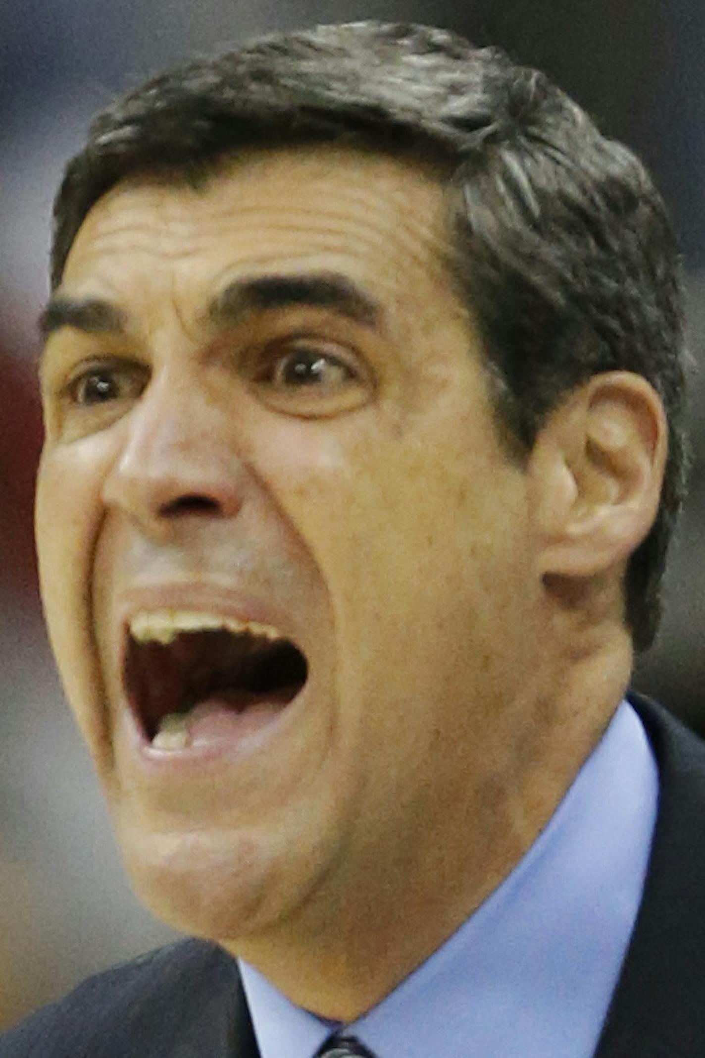 Villanova coach Jay Wright yells to his team during the second half of a second-round game against North Carolina in the NCAA college basketball tournament at the Sprint Center in Kansas City, Mo., Friday, March 22, 2013. North Carolina defeated Villanova 78-71. (AP Photo/Orlin Wagner)