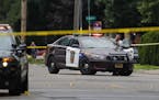 Police invesitigated the scene of a shooting between a suspect and South St. Paul police officer who was injured a little past noon on 7/19/2018