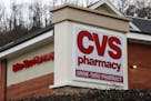 This Jan. 18, 2017, file photo shows a CVS Pharmacy in Pittsburgh. (AP Photo/Gene J. Puskar, File)