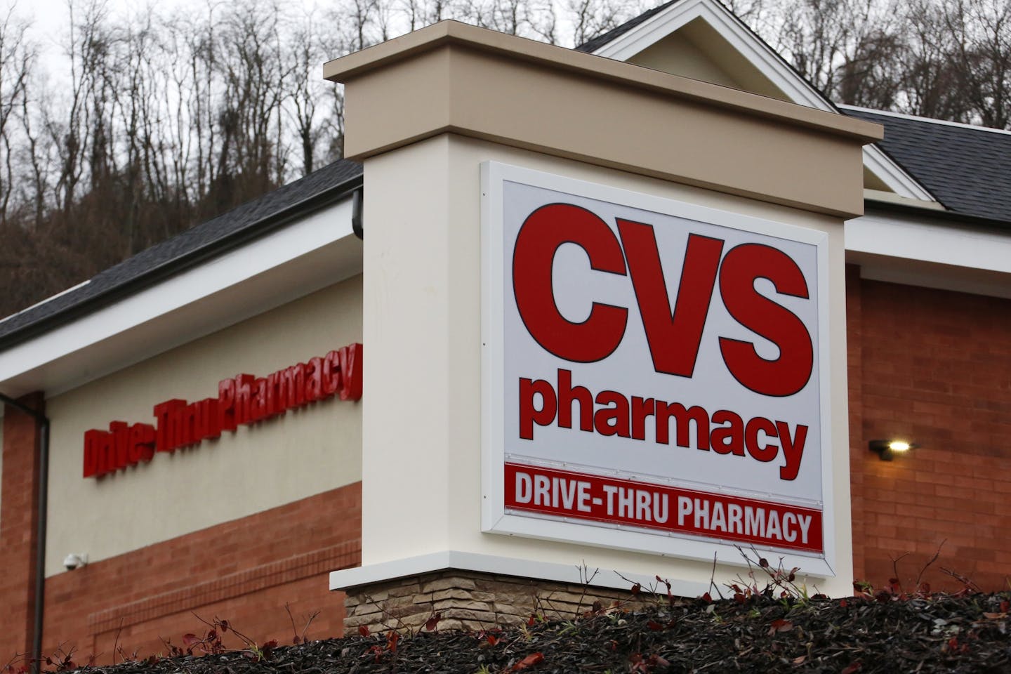 This Jan. 18, 2017, file photo shows a CVS Pharmacy in Pittsburgh. (AP Photo/Gene J. Puskar, File)