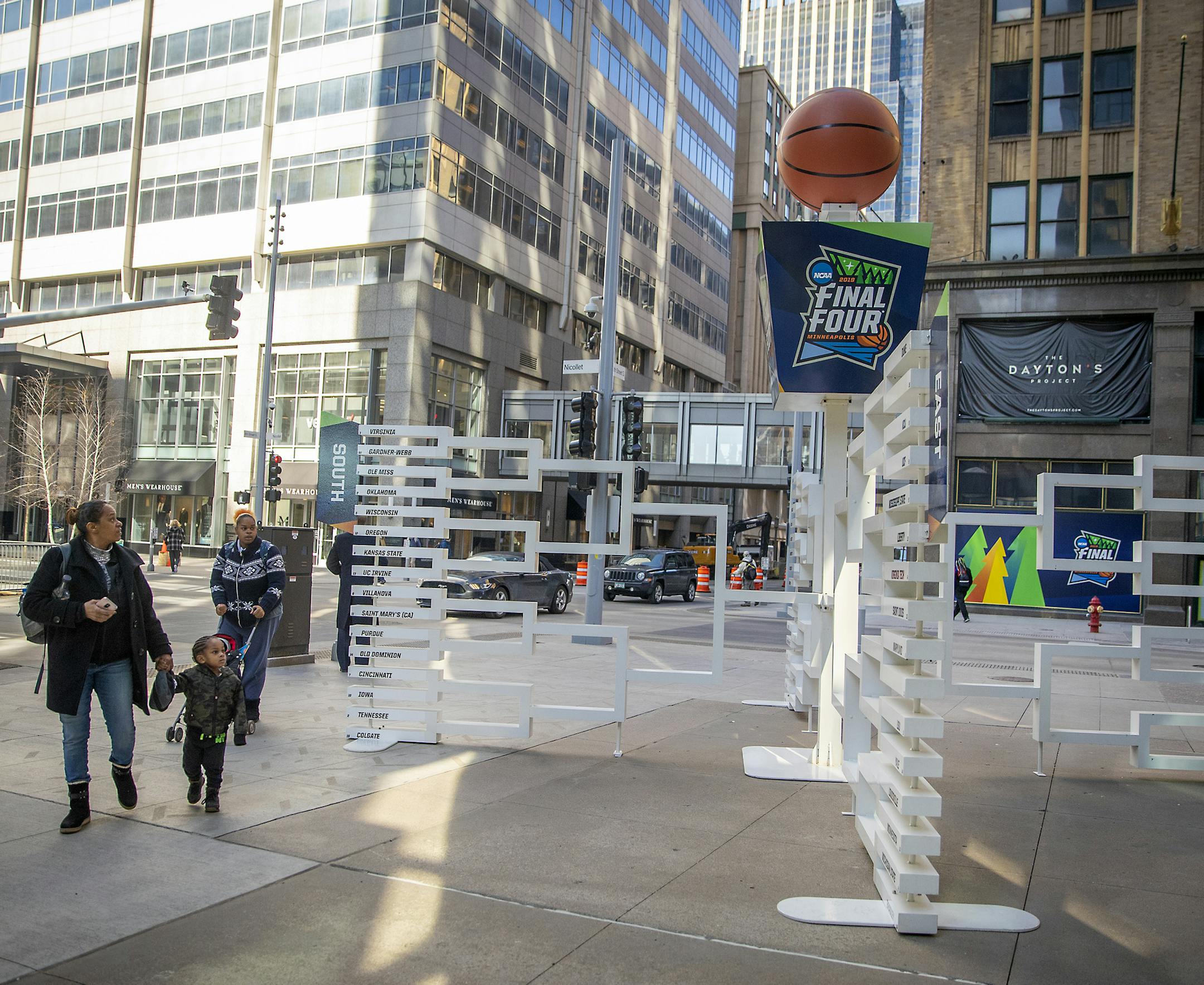 Pedestrians made their way by a 3D sculpture of the Final Four bracket on the Nicollet Mall just outside the IDS tower.